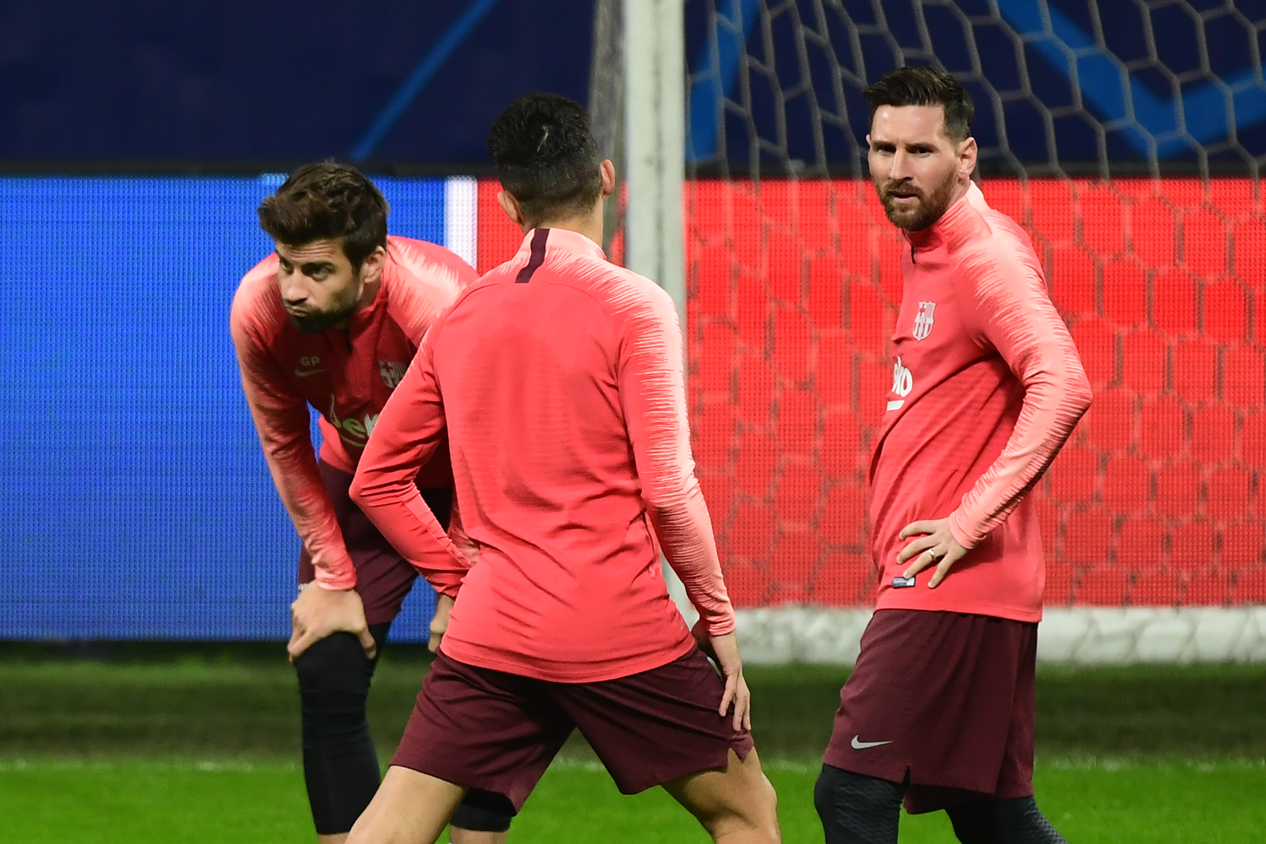 Barcelona's Spanish defender Gerard Pique (L) and Barcelona's Argentinian forward Lionel Messi (R) look on during a training session on November 5, 2018 at San Siro stadium, on the eve of the UEFA Champions League group B football match Inter Milan vs Barcelone. (Photo by Miguel MEDINA / AFP)        (Photo credit should read MIGUEL MEDINA/AFP/Getty Images)