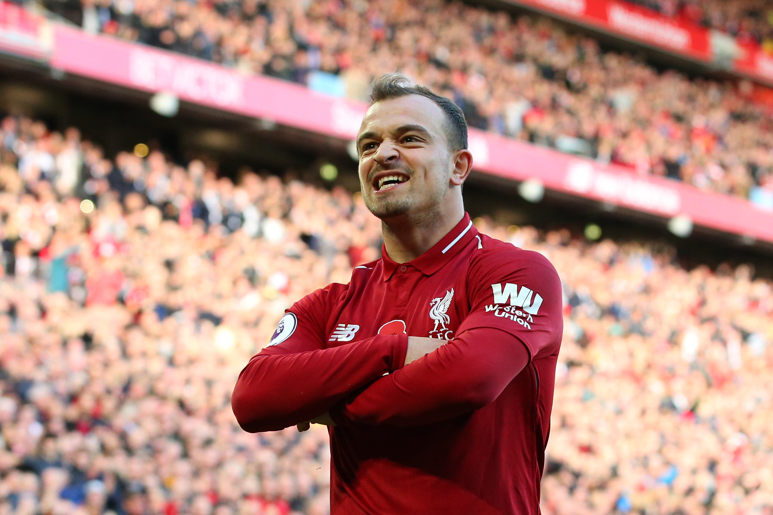 LIVERPOOL, ENGLAND - NOVEMBER 11:  Xherdan Shaqiri of Liverpool celebrates after scoring his team's second goal during the Premier League match between Liverpool FC and Fulham FC at Anfield on November 11, 2018 in Liverpool, United Kingdom.  (Photo by Alex Livesey/Getty Images)