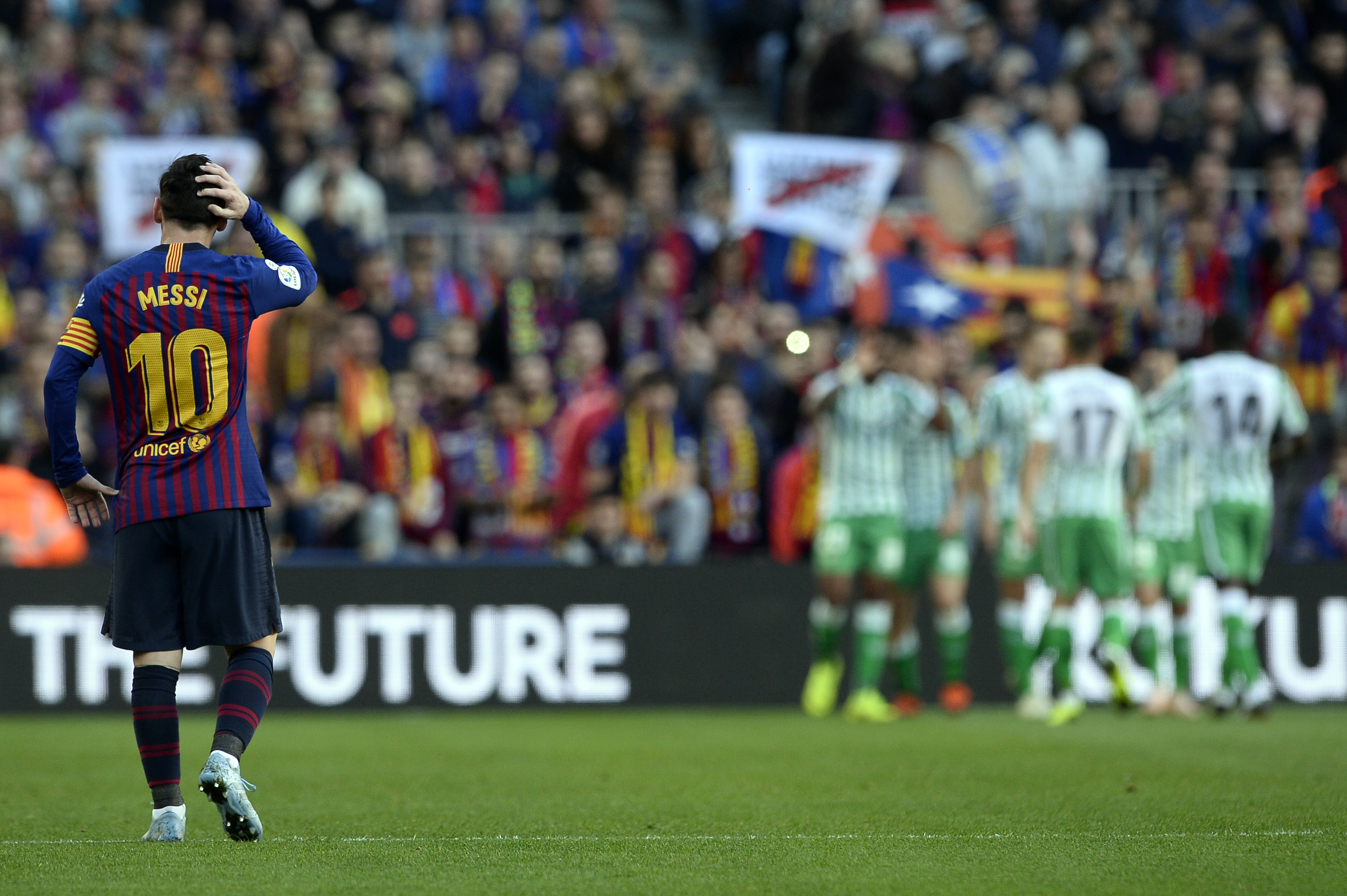 Barcelona's Argentinian forward Lionel Messi reacts to Betis' opening goal during the Spanish league football match between FC Barcelona and Real Betis at the Camp Nou stadium in Barcelona on November 11, 2018. (Photo by Josep LAGO / AFP)        (Photo credit should read JOSEP LAGO/AFP/Getty Images)