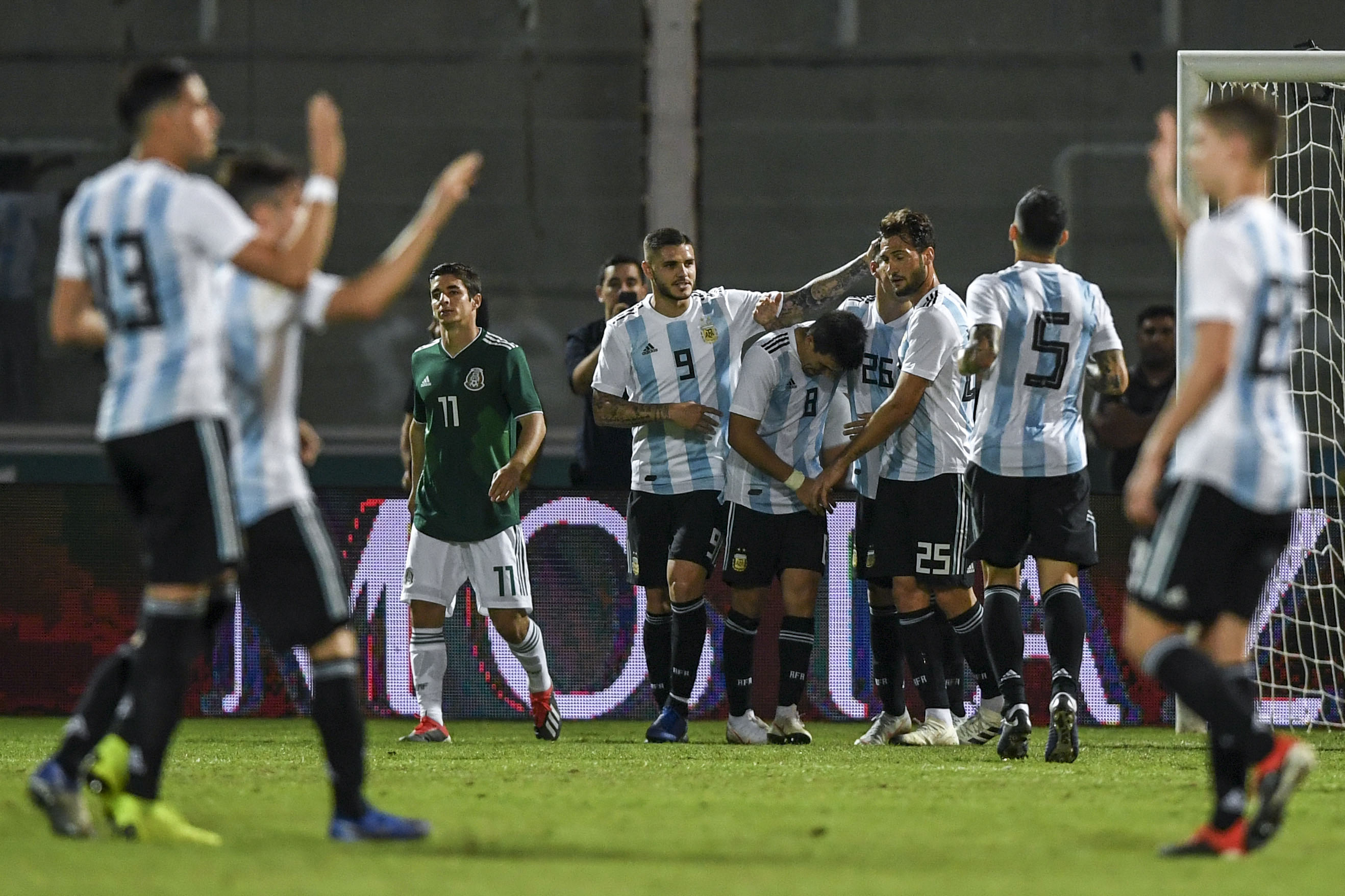 Argentina's forward Mauro Icardi (C) celebrates with teammates after scoring his team second goal against Mexico, during their friendly football match at Mario Alberto Kempes stadium in Cordoba, Argentina, on November 16, 2018. (Photo by EITAN ABRAMOVICH / AFP)        (Photo credit should read EITAN ABRAMOVICH/AFP/Getty Images)