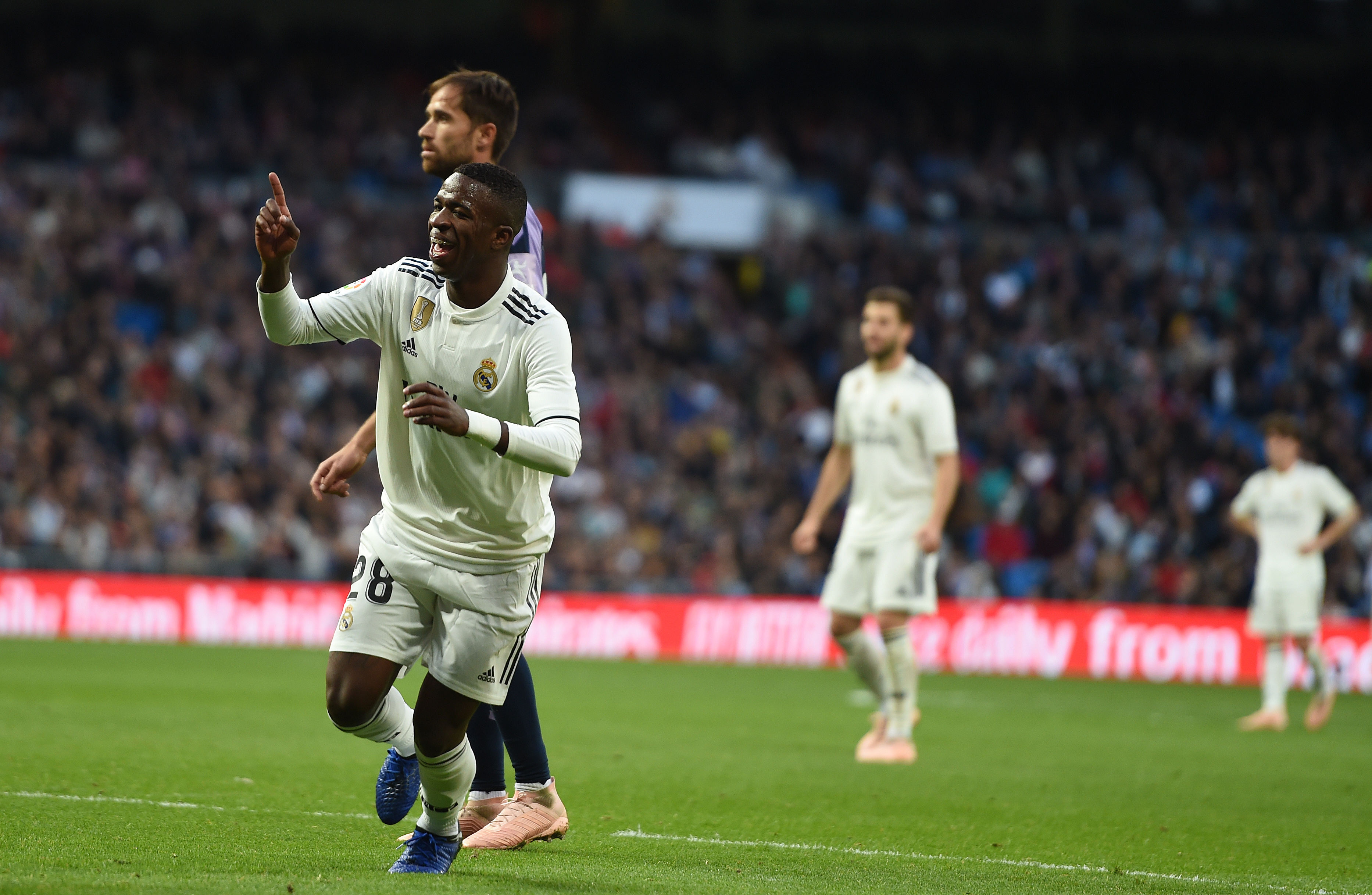 MADRID, SPAIN - NOVEMBER 03: Vinicius Junior of Real Madrid celebrates after his shot rebounded off a Valladolid player for Real's opening goal during the La Liga match between Real Madrid CF and Real Valladolid CF at Estadio Santiago Bernabeu on November 03, 2018 in Madrid, Spain. (Photo by Denis Doyle/Getty Images)