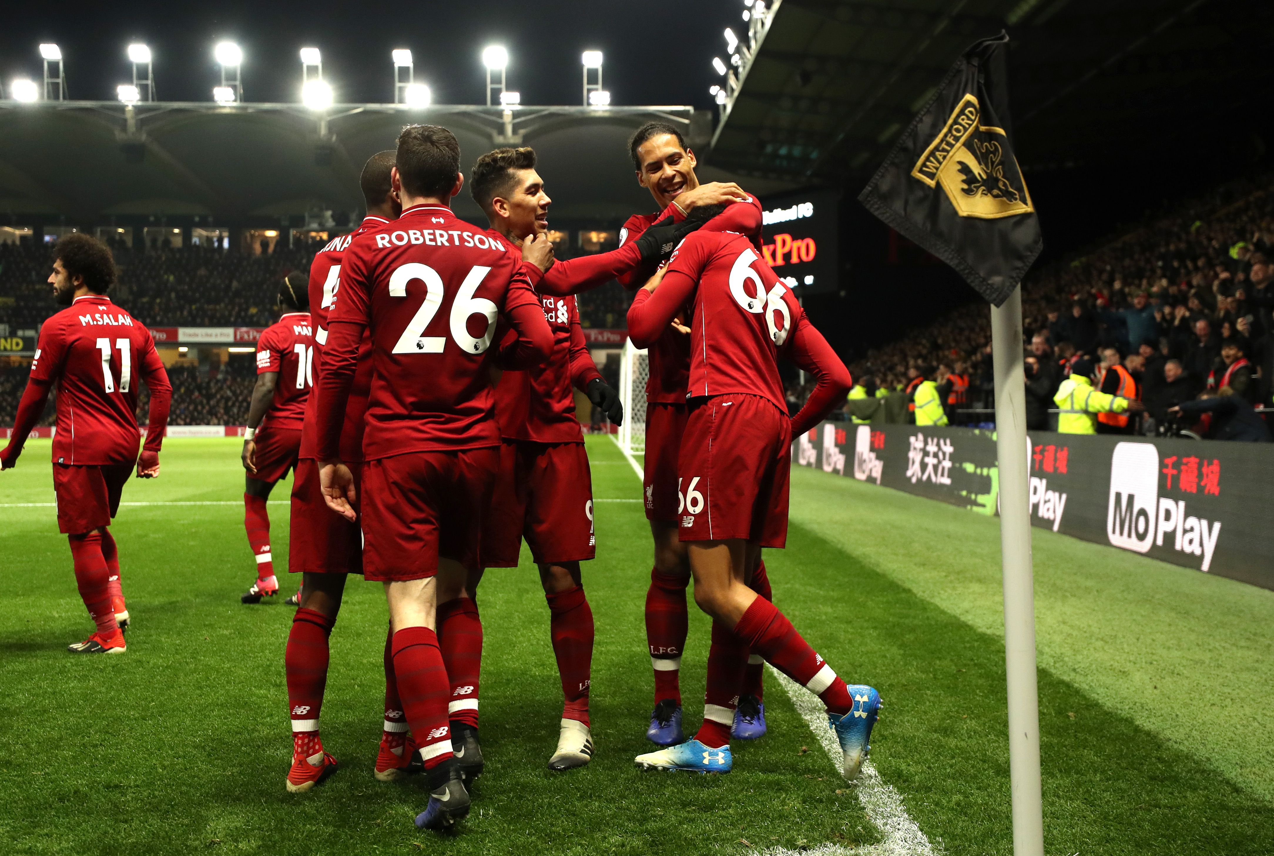 WATFORD, ENGLAND - NOVEMBER 24:  Trent Alexander-Arnold of Liverpool celebrates with teammates after scoring his team's second goal during the Premier League match between Watford FC and Liverpool FC at Vicarage Road on November 24, 2018 in Watford, United Kingdom.  (Photo by Richard Heathcote/Getty Images)