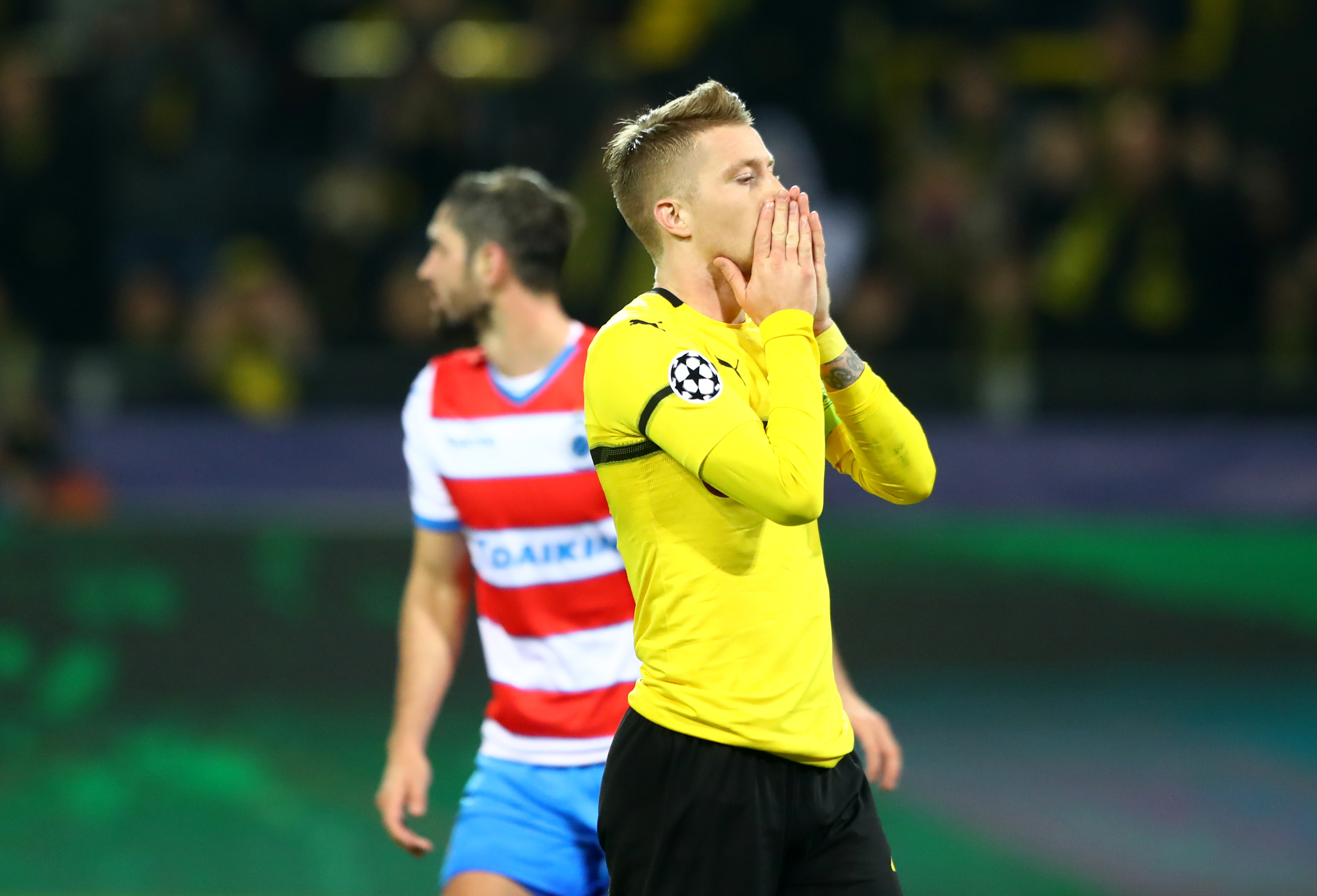 DORTMUND, GERMANY - NOVEMBER 28:  Marco Reus of Borussia Dortmund reacts during the UEFA Champions League Group A match between Borussia Dortmund and Club Brugge at Signal Iduna Park on November 28, 2018 in Dortmund, Germany.  (Photo by Martin Rose/Bongarts/Getty Images,)