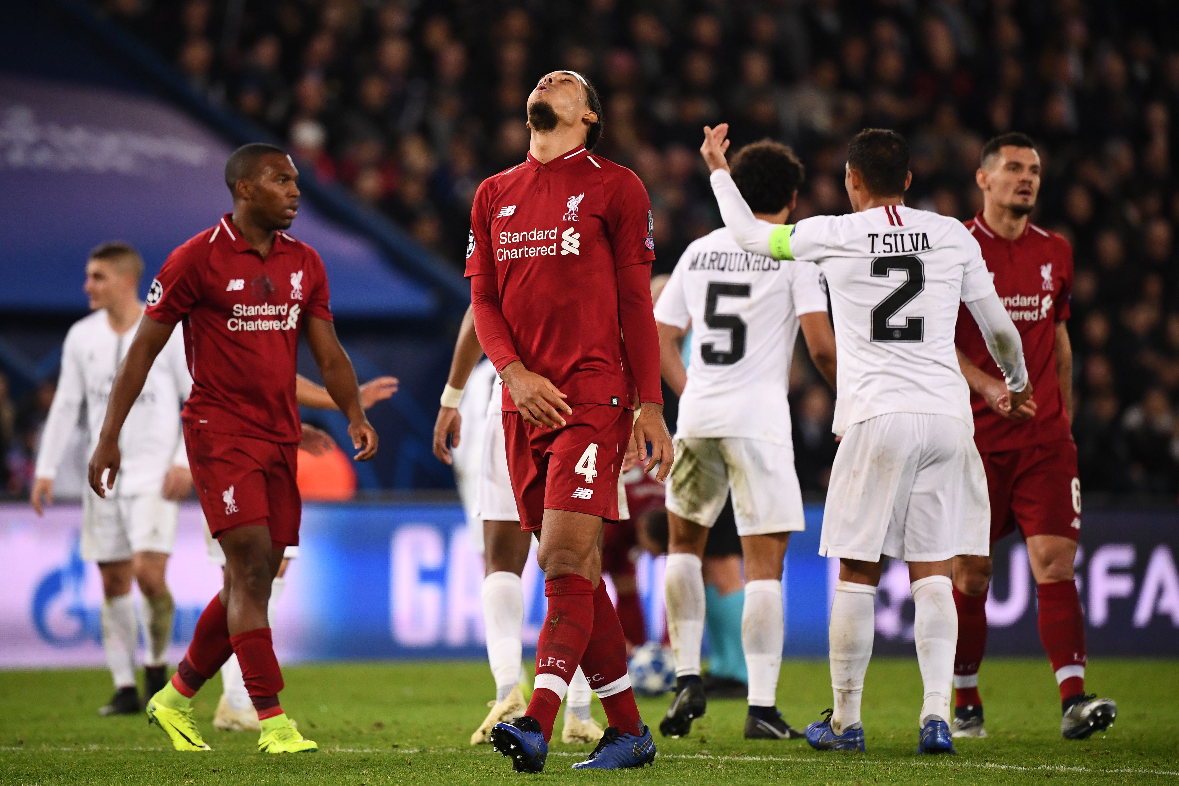 Liverpool's Dutch defender Virgil van Dijk and teammates react during the UEFA Champions League Group C football match between Paris Saint-Germain (PSG) and Liverpool FC at the Parc des Princes stadium, in Paris, on November 28, 2018. (Photo by FRANCK FIFE / AFP)        (Photo credit should read FRANCK FIFE/AFP/Getty Images)