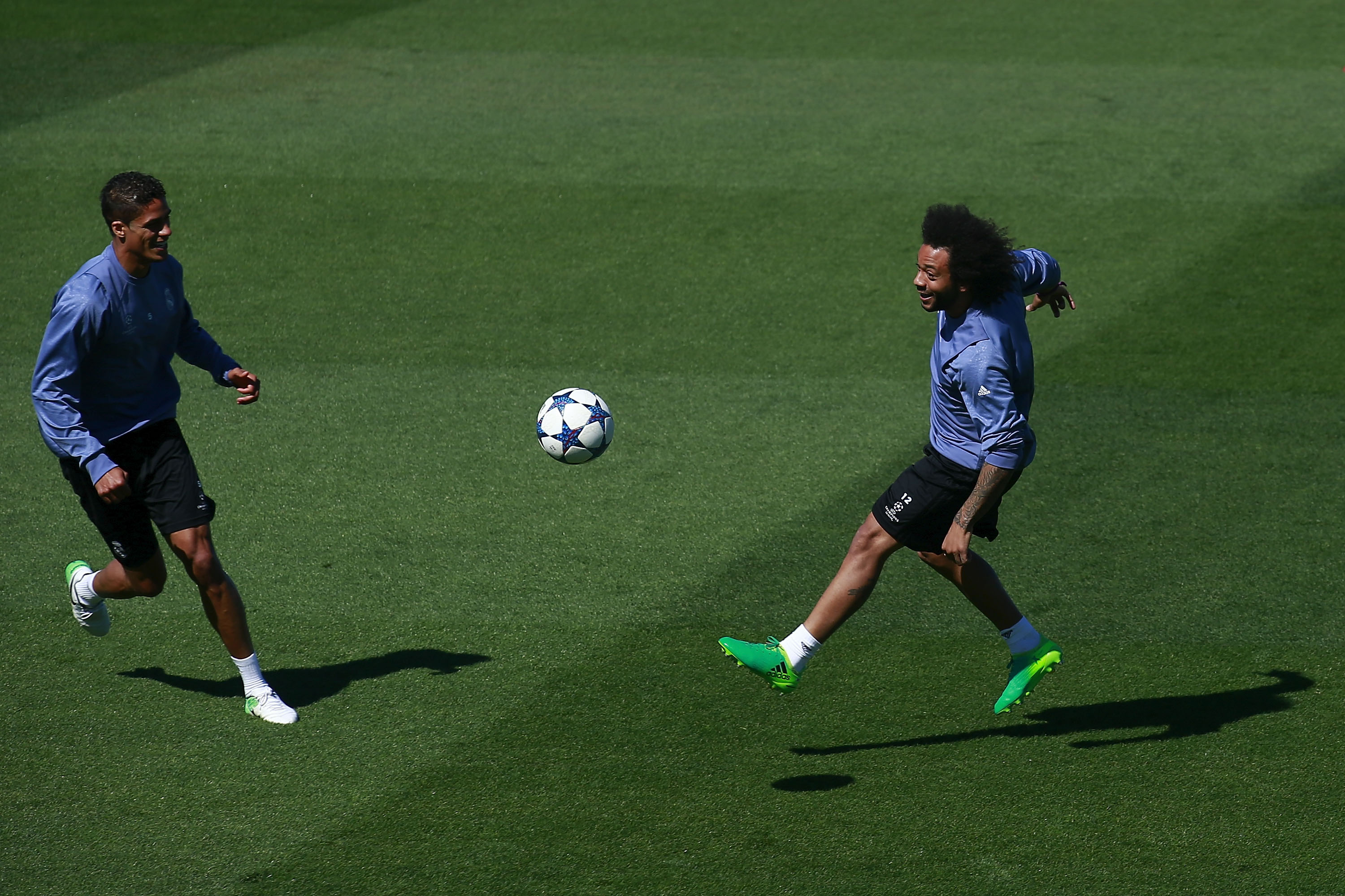 MADRID, SPAIN - MAY 01: Marcelo (R) of Real Madrid CF excersises with his teammate Raphael Varane (L) druing a training session ahead of the UEFA Champions League Semifinal First leg match between Real Madrid CF and Club atletico de Madrid at Valdebebas training ground on May 1, 2017 in Madrid, Spain.  (Photo by Gonzalo Arroyo Moreno/Getty Images)