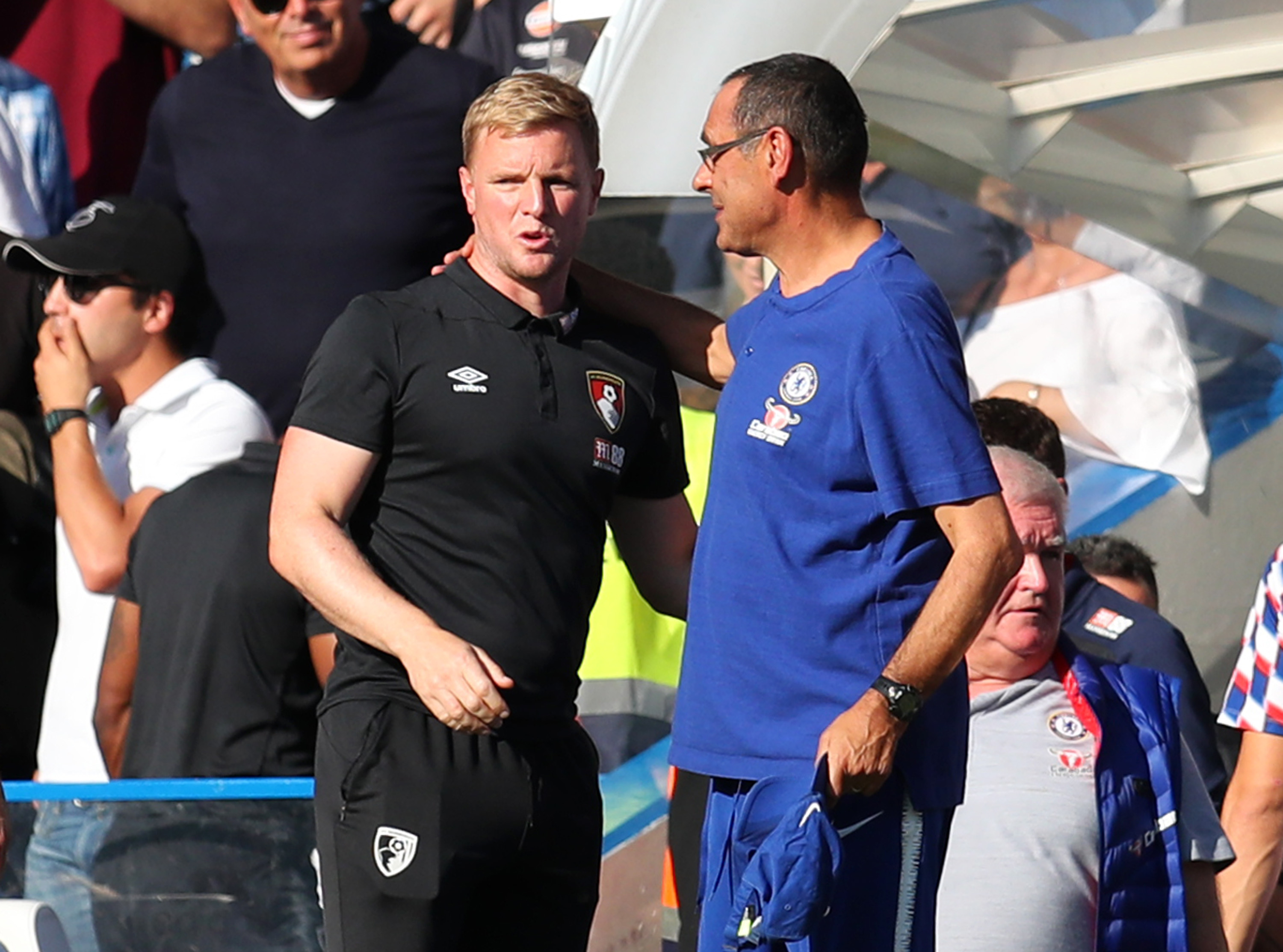 LONDON, ENGLAND - SEPTEMBER 01:  Eddie Howe, Manager of AFC Bournemouth and Maurizio Sarri, Manager of Chelsea speak following the Premier League match between Chelsea FC and AFC Bournemouth at Stamford Bridge on September 1, 2018 in London, United Kingdom.  (Photo by Catherine Ivill/Getty Images)