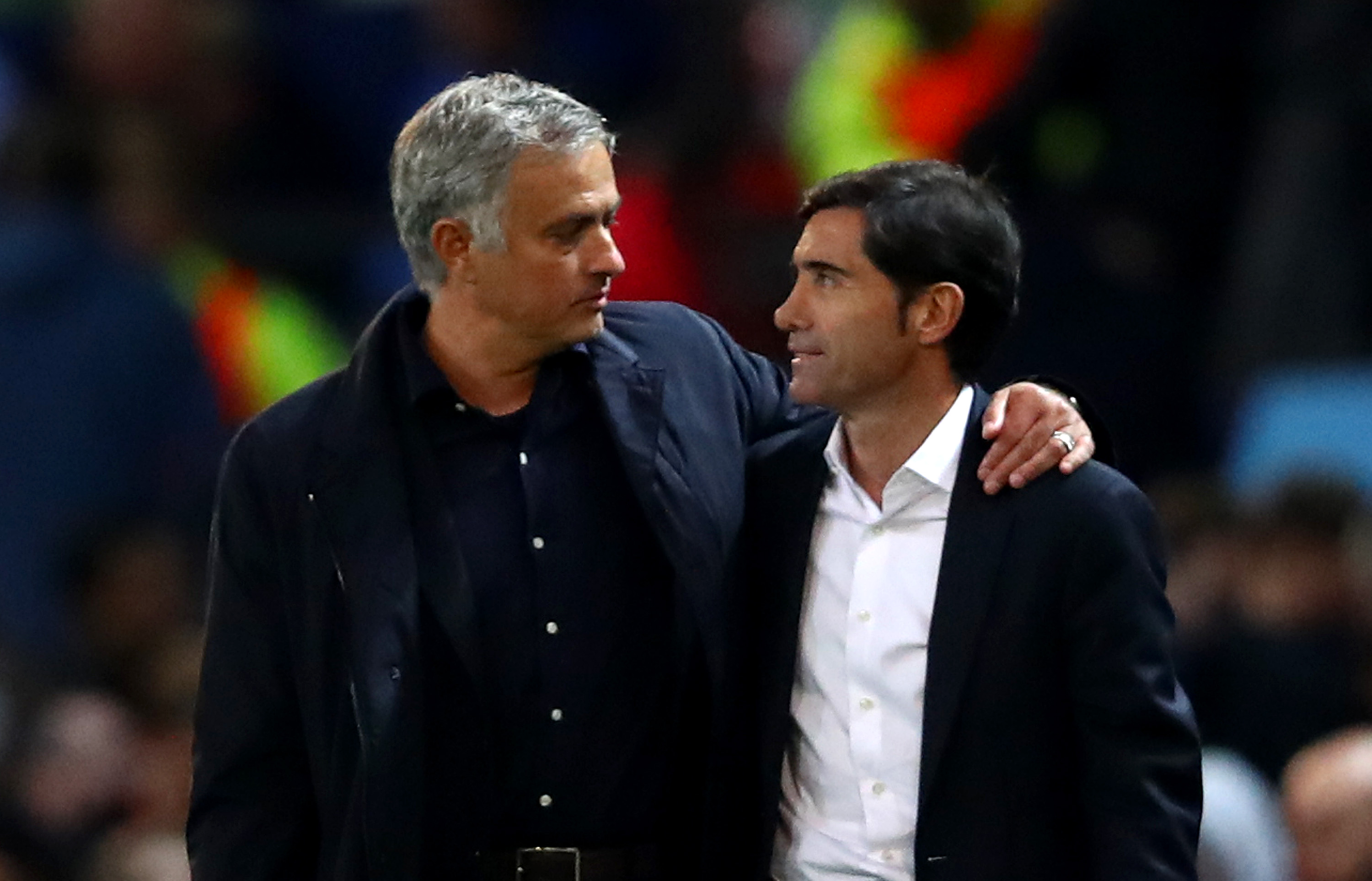 MANCHESTER, ENGLAND - OCTOBER 02:  Jose Mourinho, Manager of Manchester United speaks with Marcelino Garcia Toral, Manager of Valencia after the Group H match of the UEFA Champions League between Manchester United and Valencia at Old Trafford on October 2, 2018 in Manchester, United Kingdom.  (Photo by Clive Brunskill/Getty Images)