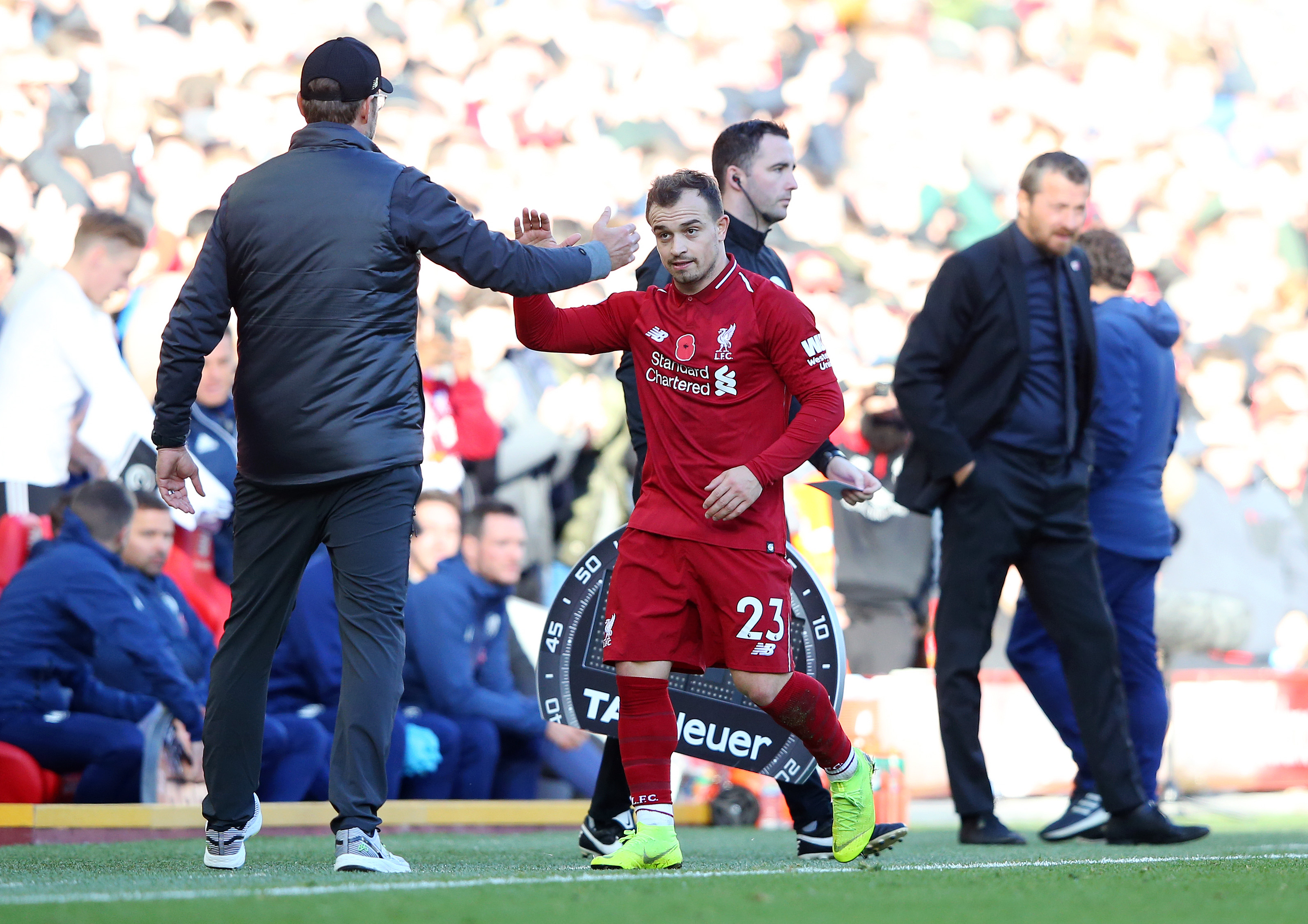LIVERPOOL, ENGLAND - NOVEMBER 11:  Xherdan Shaqiri of Liverpool is congratulated by Jurgen Klopp, Manager of Liverpool as he is substituted during the Premier League match between Liverpool FC and Fulham FC at Anfield on November 11, 2018 in Liverpool, United Kingdom.  (Photo by Alex Livesey/Getty Images)