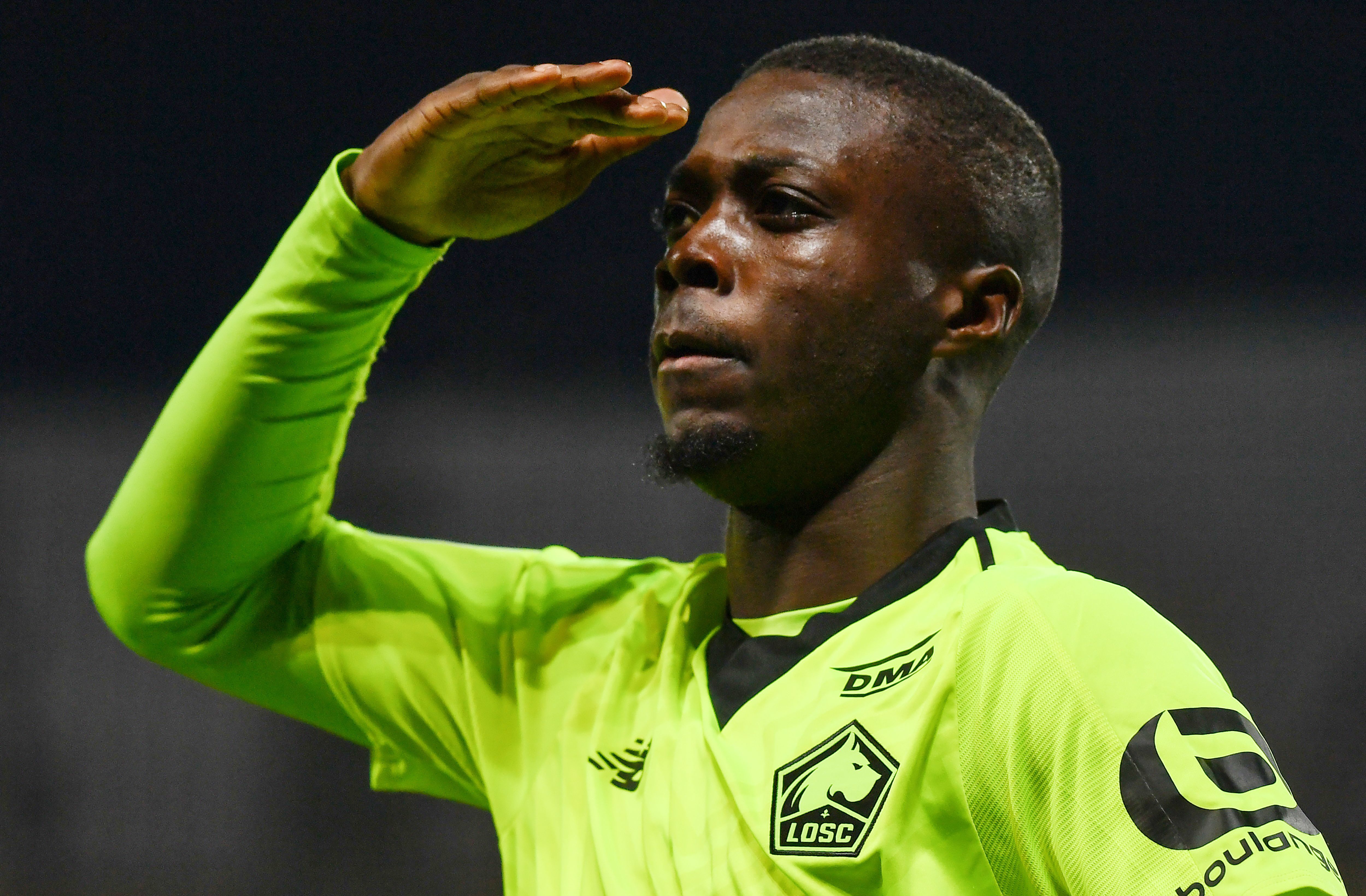 Lille's Ivorian forward Nicolas Pepe celebrates after scoring a goal during the French L1 football match between Montpellier and Lille on December 4, 2018 at the the Mosson stadium in Montpellier, southern France. (Photo by PASCAL GUYOT / AFP)        (Photo credit should read PASCAL GUYOT/AFP/Getty Images)