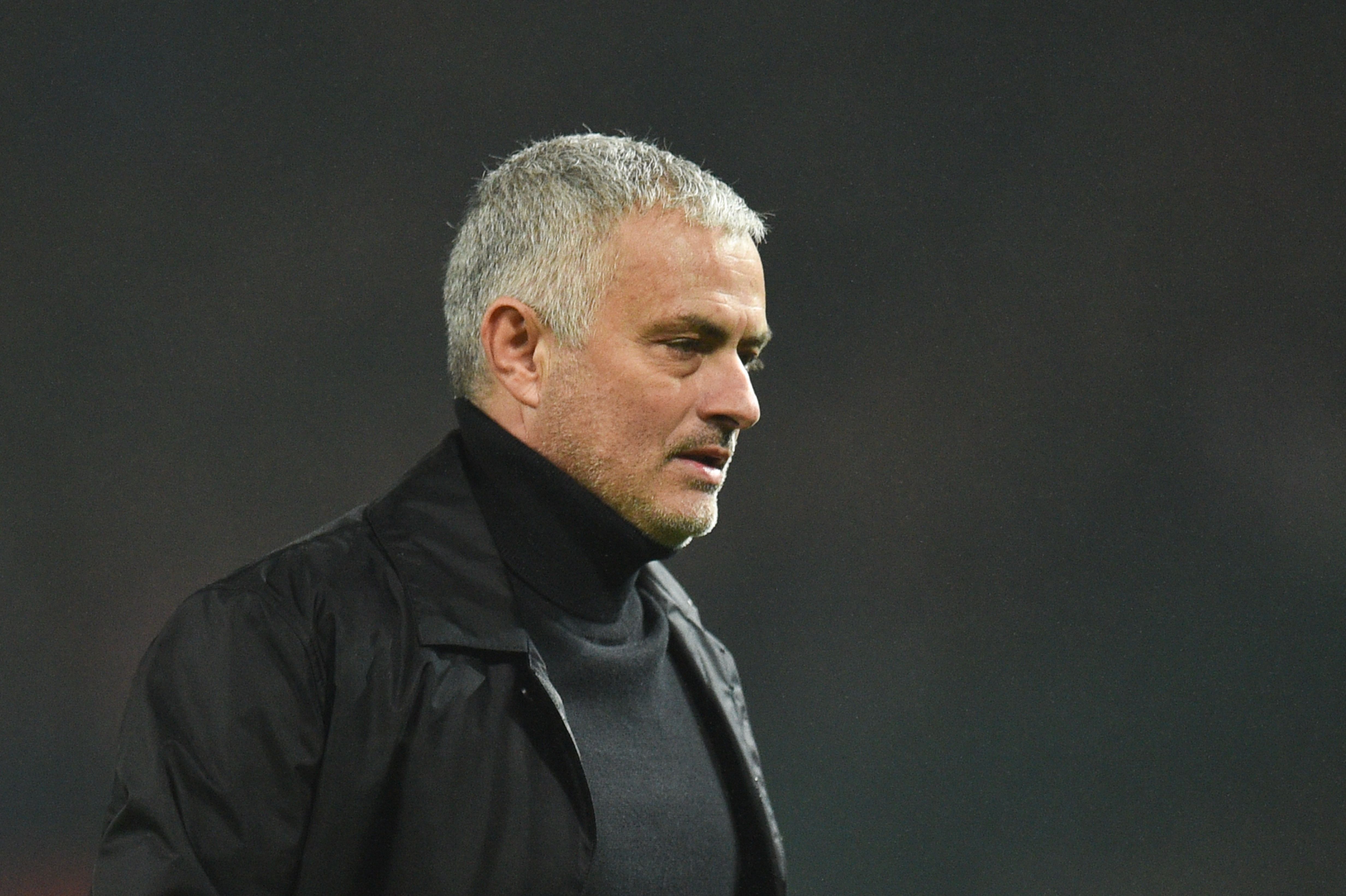 Manchester United's Portuguese manager Jose Mourinho leaves at the end of the English Premier League football match between Manchester United and Arsenal at Old Trafford in Manchester, north west England, on December 5, 2018. (Photo by Oli SCARFF / AFP) / RESTRICTED TO EDITORIAL USE. No use with unauthorized audio, video, data, fixture lists, club/league logos or 'live' services. Online in-match use limited to 120 images. An additional 40 images may be used in extra time. No video emulation. Social media in-match use limited to 120 images. An additional 40 images may be used in extra time. No use in betting publications, games or single club/league/player publications. /         (Photo credit should read OLI SCARFF/AFP/Getty Images)