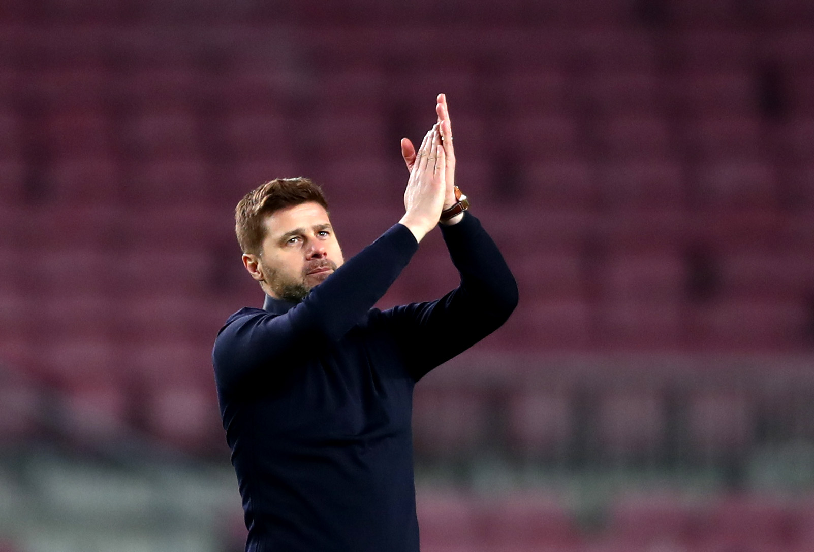 BARCELONA, SPAIN - DECEMBER 11:  Mauricio Pochettino, Manager of Tottenham Hotspur applauds the travelling fans after the UEFA Champions League Group B match between FC Barcelona and Tottenham Hotspur at Camp Nou on December 11, 2018 in Barcelona, Spain.  (Photo by Clive Rose/Getty Images)