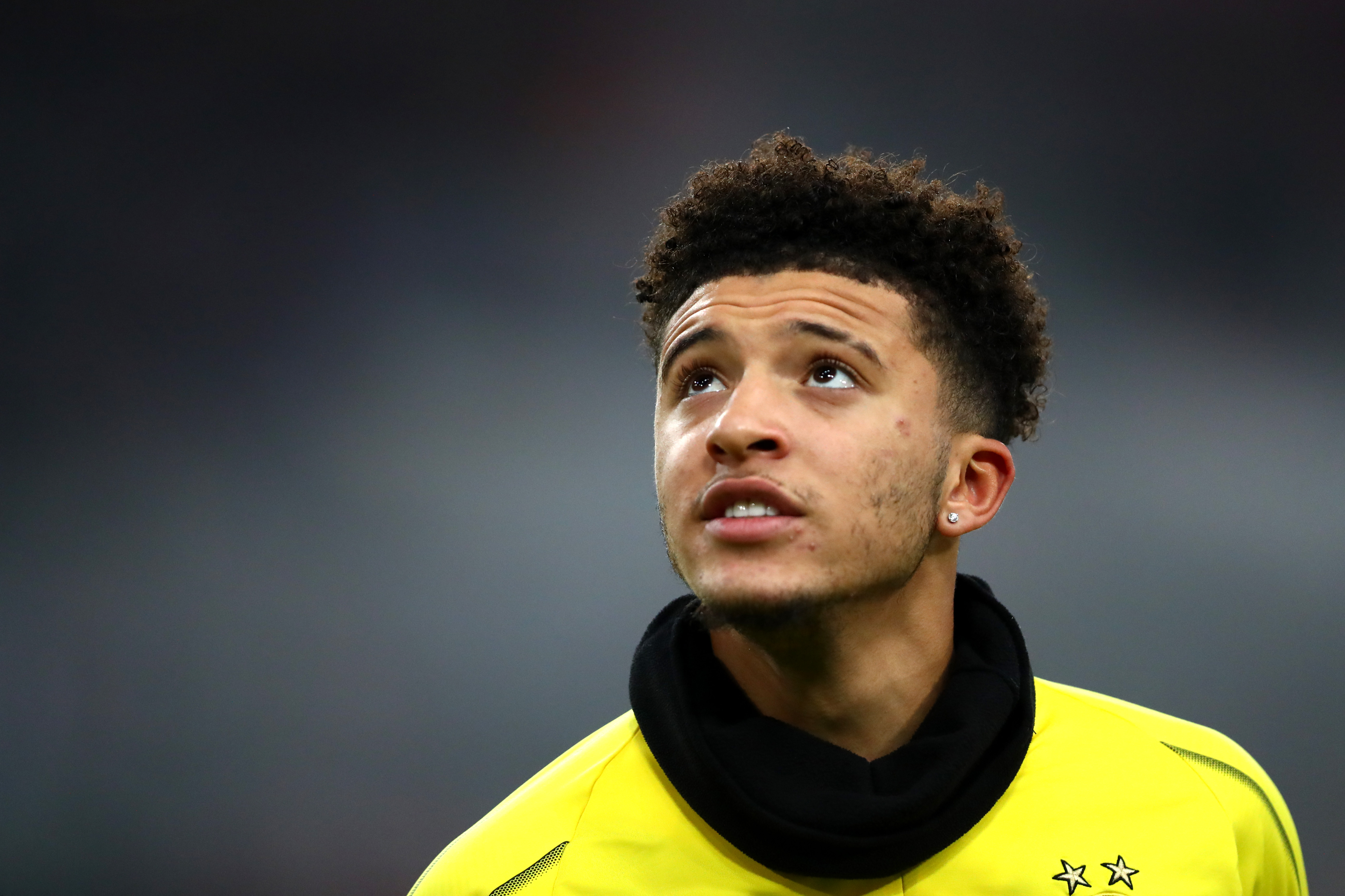 DUESSELDORF, GERMANY - DECEMBER 18:  Jadon Sancho of Borussia Dortmund warms up prior to the Bundesliga match between Fortuna Duesseldorf and Borussia Dortmund at Esprit-Arena on December 18, 2018 in Duesseldorf, Germany.  (Photo by Dean Mouhtaropoulos/Bongarts/Getty Images)