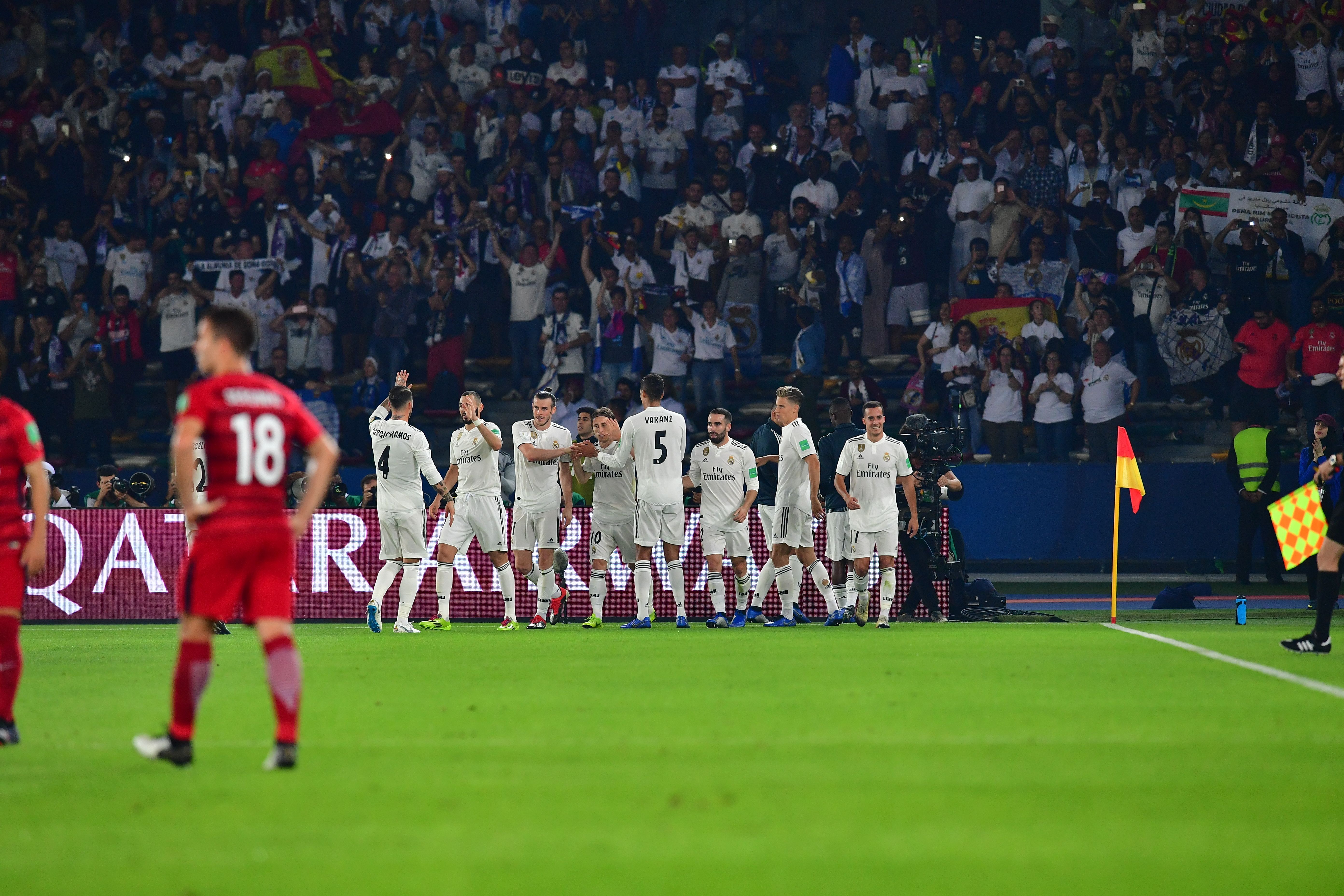 Real Madrid players celebrate their goal during the semi final football match of the FIFA Club World Cup 2018 tournament between Japan's Kashima Antlers and Spain's Real Madrid at the Zayed Sports City Stadium in Abu Dhabi, the capital of the United Arab Emirates, on December 19, 2018. (Photo by Giuseppe CACACE / AFP)        (Photo credit should read GIUSEPPE CACACE/AFP/Getty Images)