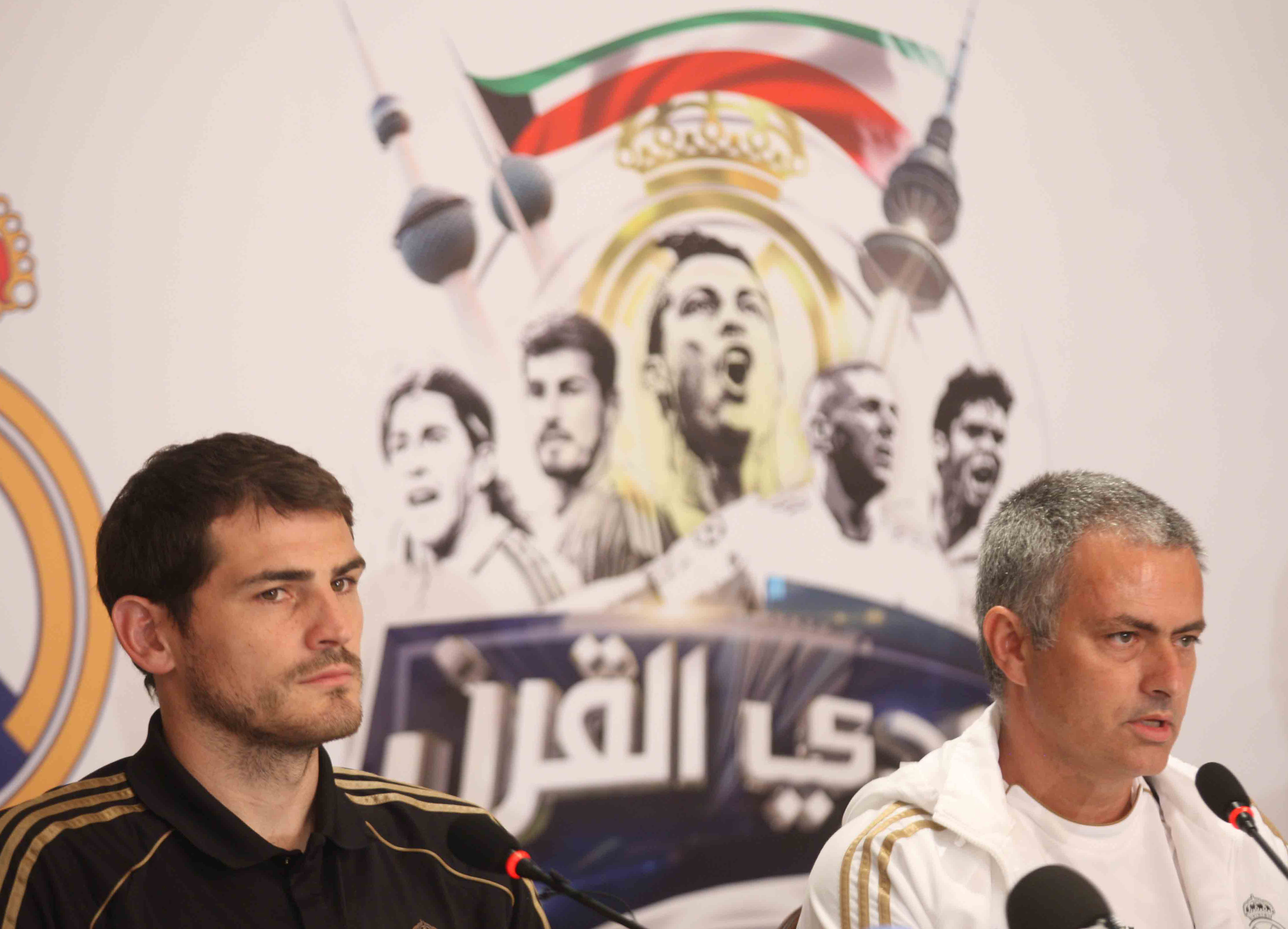 Portuguese manager of the Real Madrid football team, Jose Mourinho (R), and Captain, Iker Casillas, attend a press conference in Kuwait City on May 15, 2012. Real Madrid are to play a friendly match against Kuwait’s national football team on May 16, at al-Kuwait SC stadium in Kuwait City. AFP PHOTO / YASSER AL-ZAYYAT        (Photo credit should read YASSER AL-ZAYYAT/AFP/GettyImages)