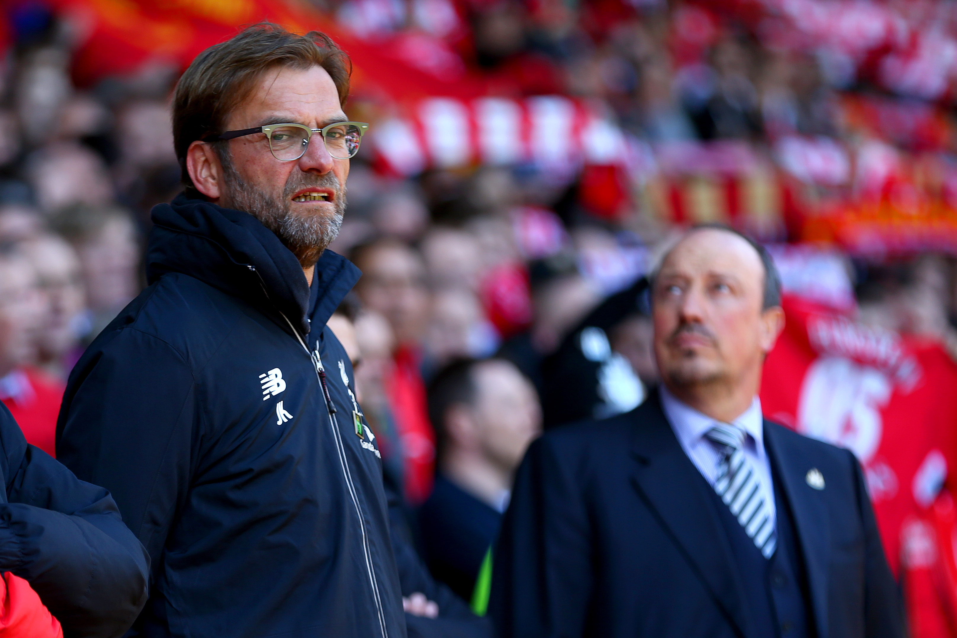 LIVERPOOL, ENGLAND - APRIL 23:  Jurgen Klopp, manager of Liverpool iand Rafa Benitez, Manager of Newcastle United look on during the Barclays Premier League match between Liverpool and Newcastle United at Anfield on April 23, 2016 in Liverpool, United Kingdom.  (Photo by Clive Brunskill/Getty Images)