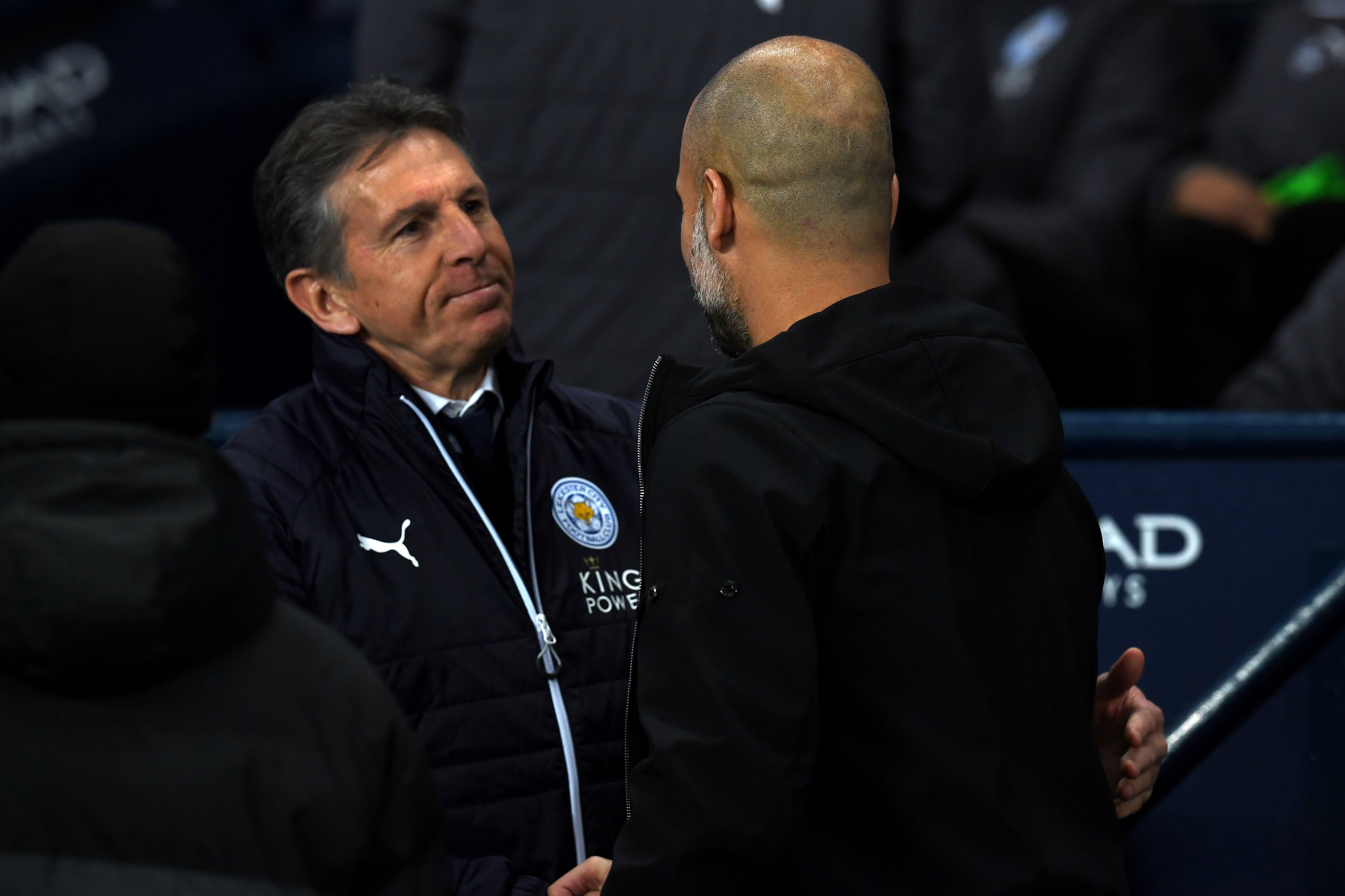 Leicester City's French manager Claude Puel (L) and Manchester City's Spanish manager Pep Guardiola greet before the English Premier League football match between Manchester City and Leicester City at the Etihad Stadium in Manchester, north west England, on February 10, 2018. / AFP PHOTO / Paul ELLIS / RESTRICTED TO EDITORIAL USE. No use with unauthorized audio, video, data, fixture lists, club/league logos or 'live' services. Online in-match use limited to 75 images, no video emulation. No use in betting, games or single club/league/player publications.  /         (Photo credit should read PAUL ELLIS/AFP/Getty Images)