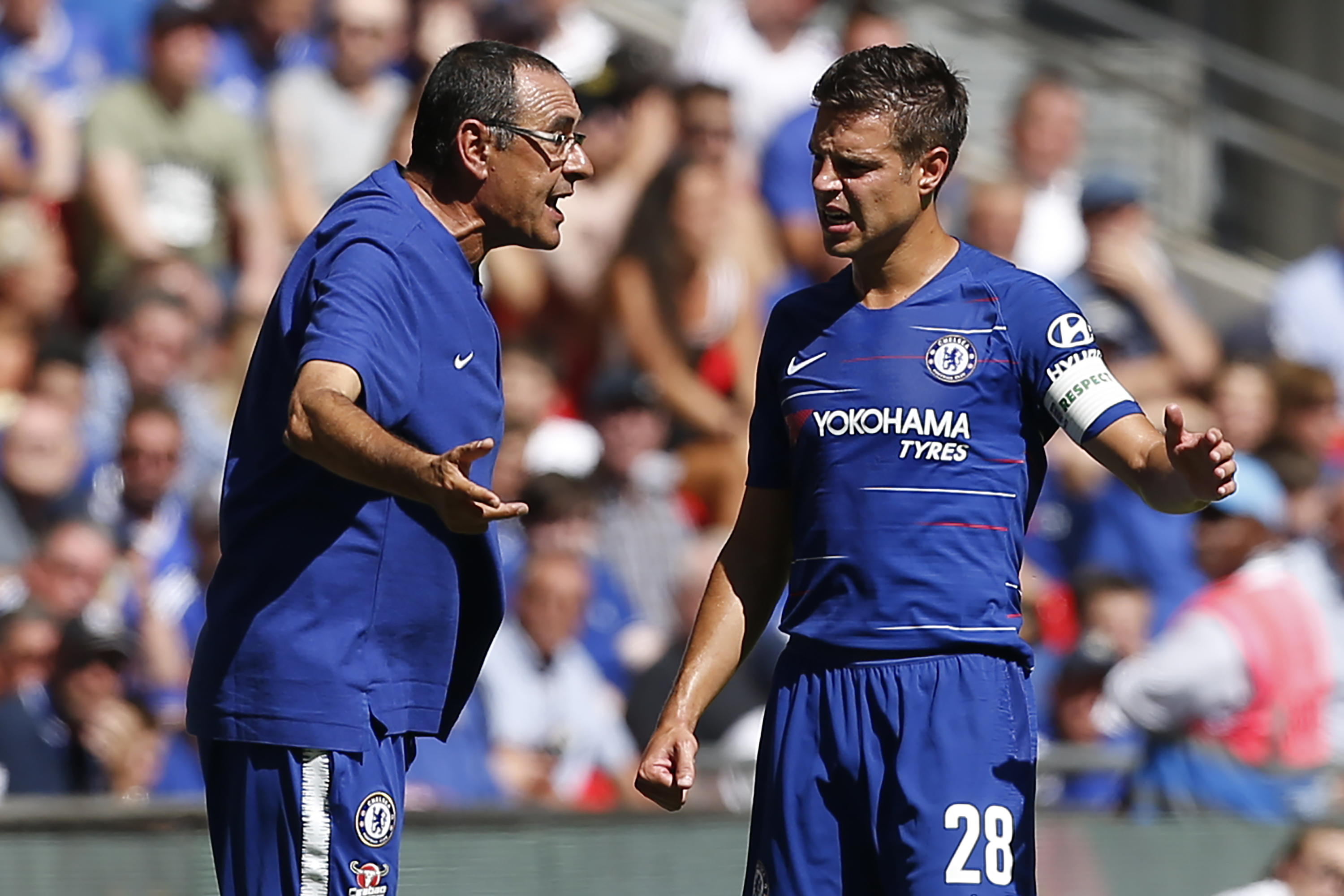 Chelsea's Italian head coach Maurizio Sarri (L) talks with Chelsea's Spanish defender Cesar Azpilicueta on the touchline during the English FA Community Shield football match between Chelsea and Manchester City at Wembley Stadium in north London on August 5, 2018. (Photo by Ian KINGTON / AFP) / NOT FOR MARKETING OR ADVERTISING USE / RESTRICTED TO EDITORIAL USE        (Photo credit should read IAN KINGTON/AFP/Getty Images)