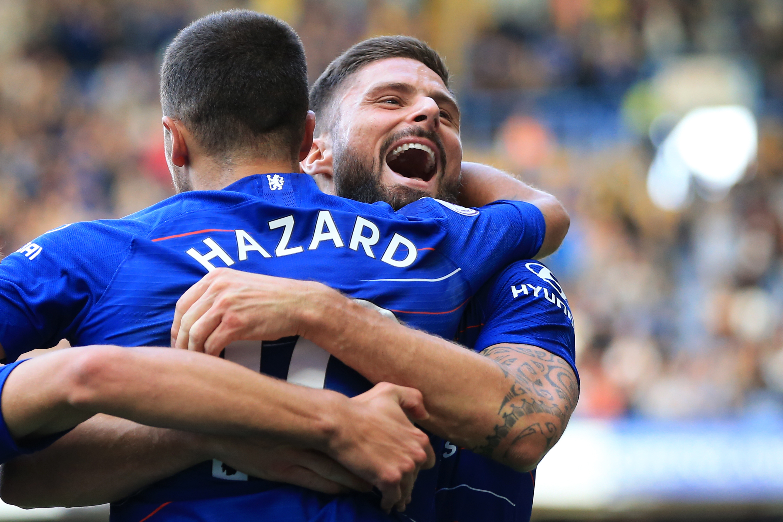 LONDON, ENGLAND - SEPTEMBER 15: Olivier Giroud celebrates with Eden Hazard of Chelsea during the Premier League match between Chelsea FC and Cardiff City at Stamford Bridge on September 15, 2018 in London, United Kingdom. (Photo by Marc Atkins/Getty Images)