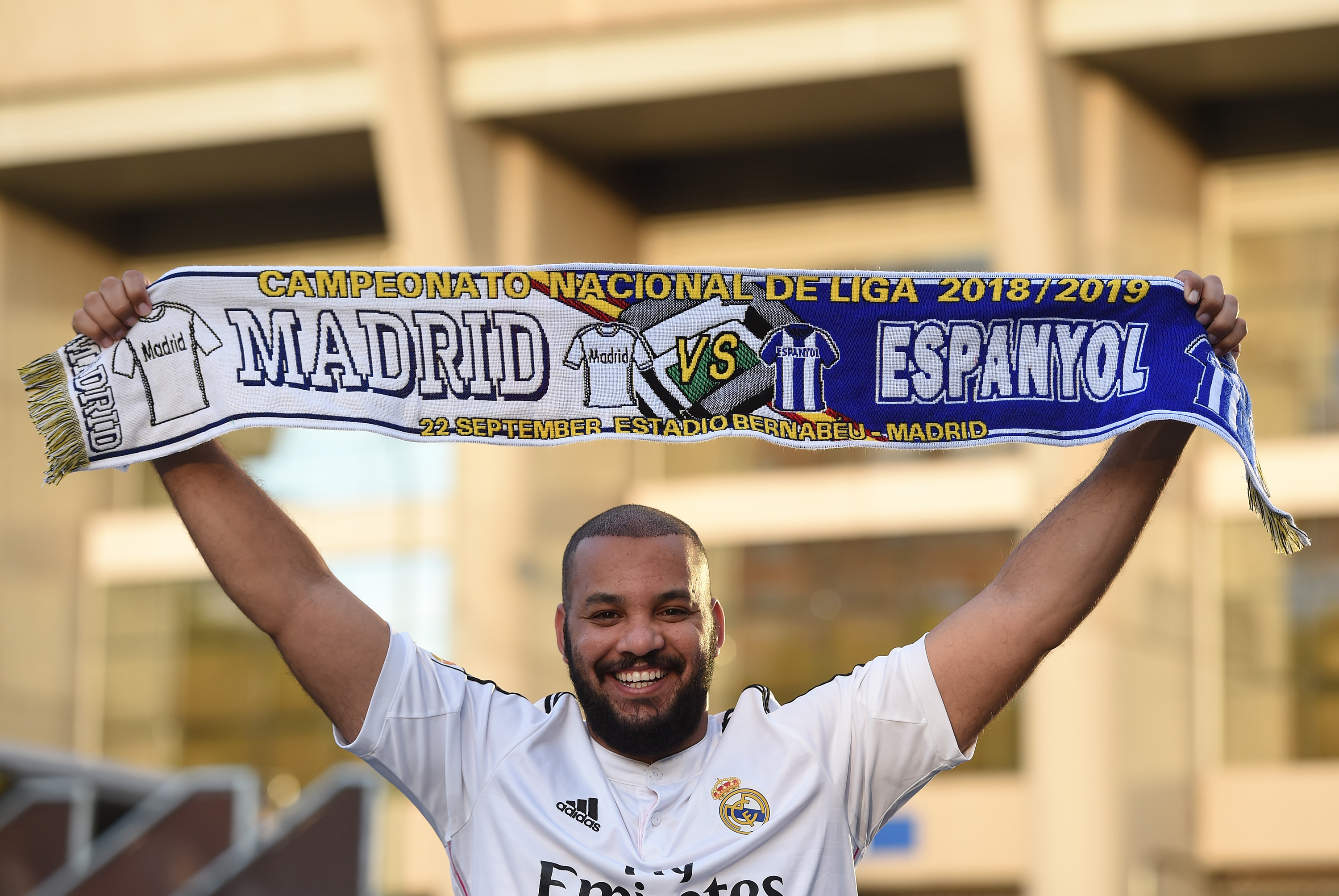 MADRID, SPAIN - SEPTEMBER 22:  Obaid of Dubai  posing for a photograph holding up the scarf for the Real Madrid v Espanyol La Liga match ahead of the La Liga match between Real Madrid CF and RCD Espanyol at Estadio Santiago Bernabeu on September 22, 2018 in Madrid, Spain. (Photo by Denis Doyle/Getty Images,)