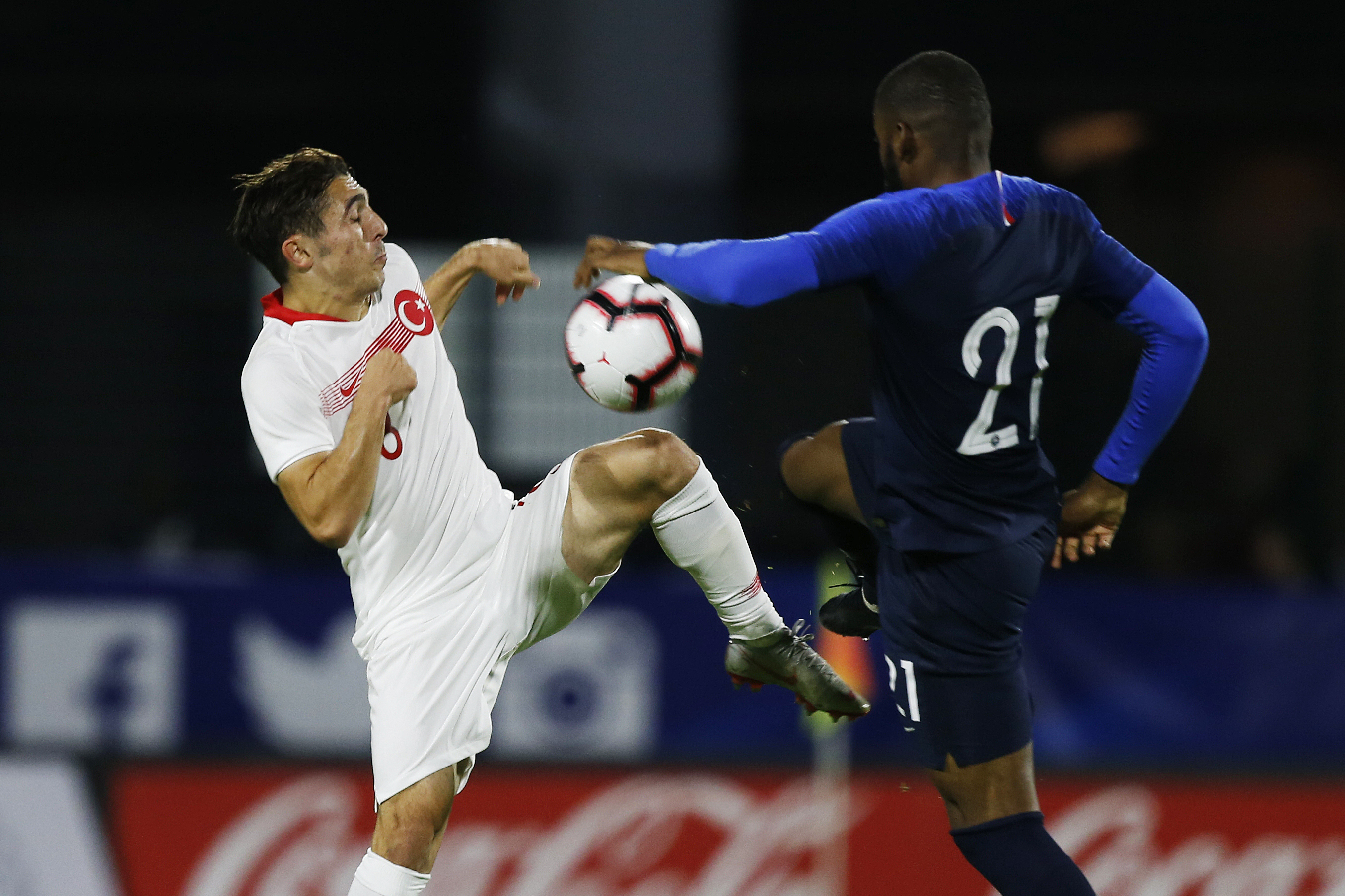 Turkey's midfielder Abdulkadir Omur vies for the ball with France's midfielder Olivier Ntcham during the friendly under-21 football match between France and Turkey at the Robert Diochon stadium in the northwestern city of Le Petit-Quevilly, northwestern France on October 12, 2018. (Photo by CHARLY TRIBALLEAU / AFP)        (Photo credit should read CHARLY TRIBALLEAU/AFP/Getty Images)