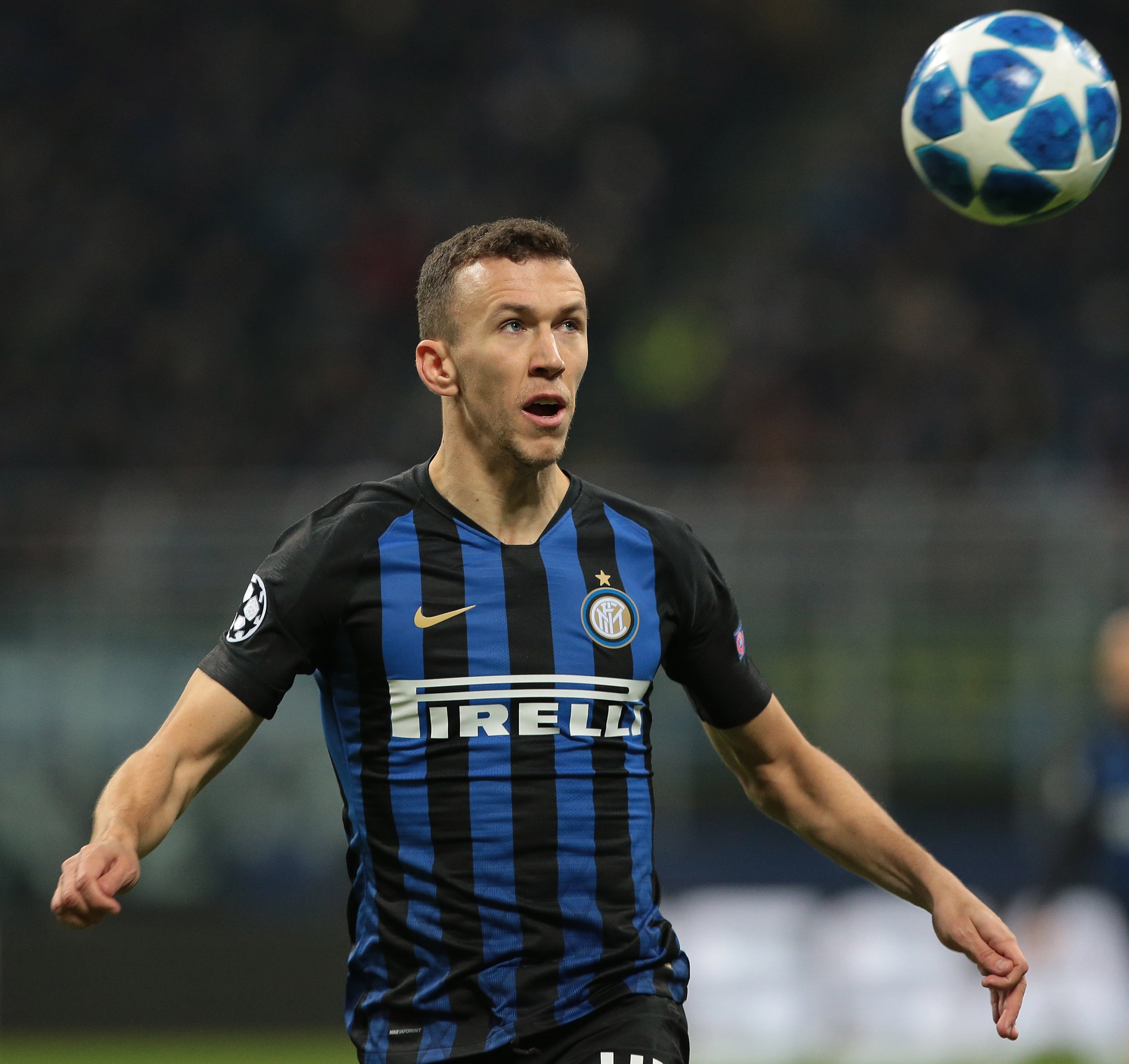 MILAN, ITALY - DECEMBER 11:  Ivan Perisic of FC Internazionale looks the ball during the UEFA Champions League Group B match between FC Internazionale and PSV at San Siro Stadium on December 11, 2018 in Milan, Italy.  (Photo by Emilio Andreoli/Getty Images)