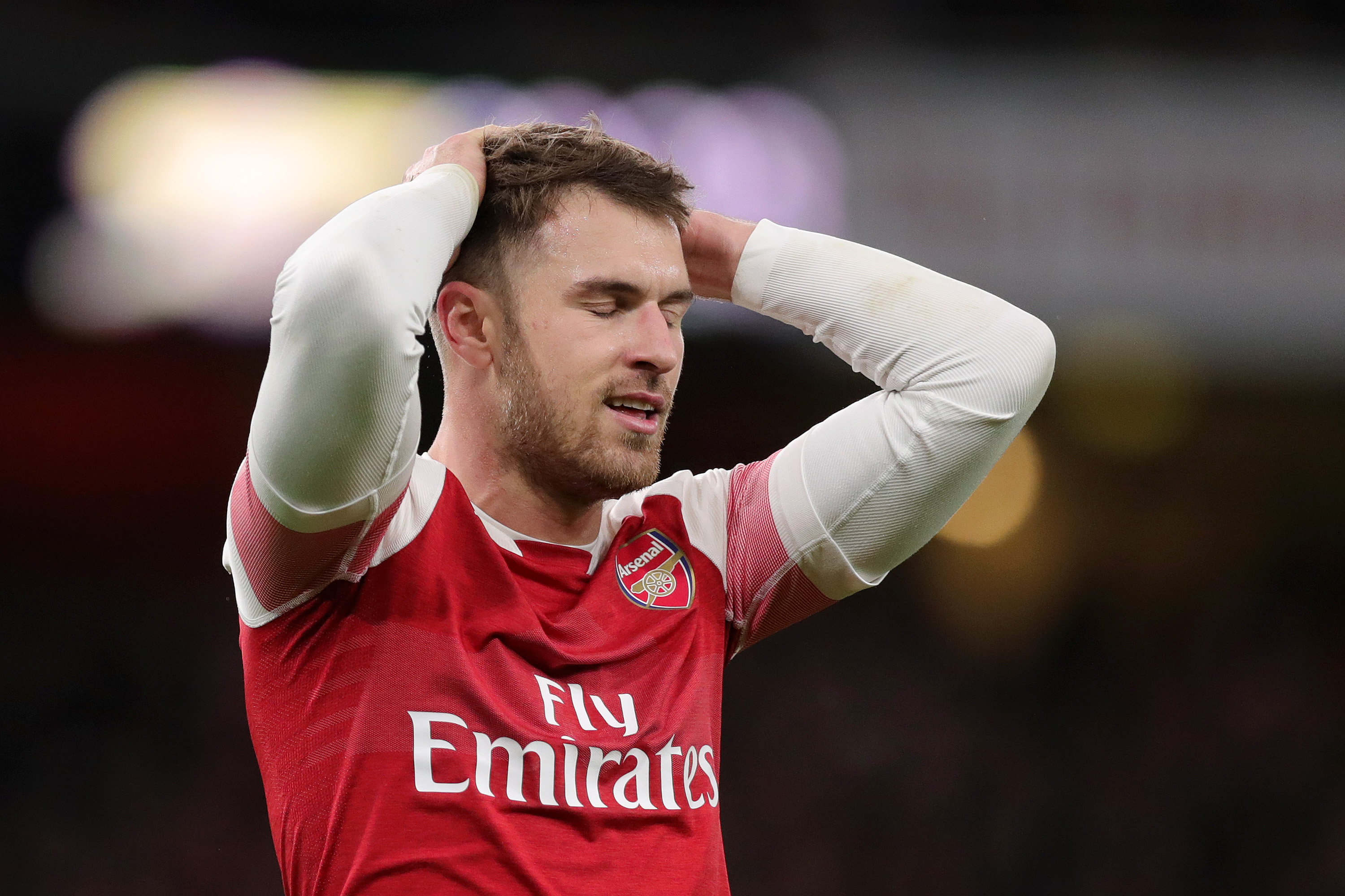 LONDON, ENGLAND - DECEMBER 19:  Aaron Ramsey of Arsenal reacts after a missed chance during the Carabao Cup Quarter Final match between Arsenal and Tottenham Hotspur at Emirates Stadium on December 19, 2018 in London, United Kingdom.  (Photo by Alex Morton/Getty Images)