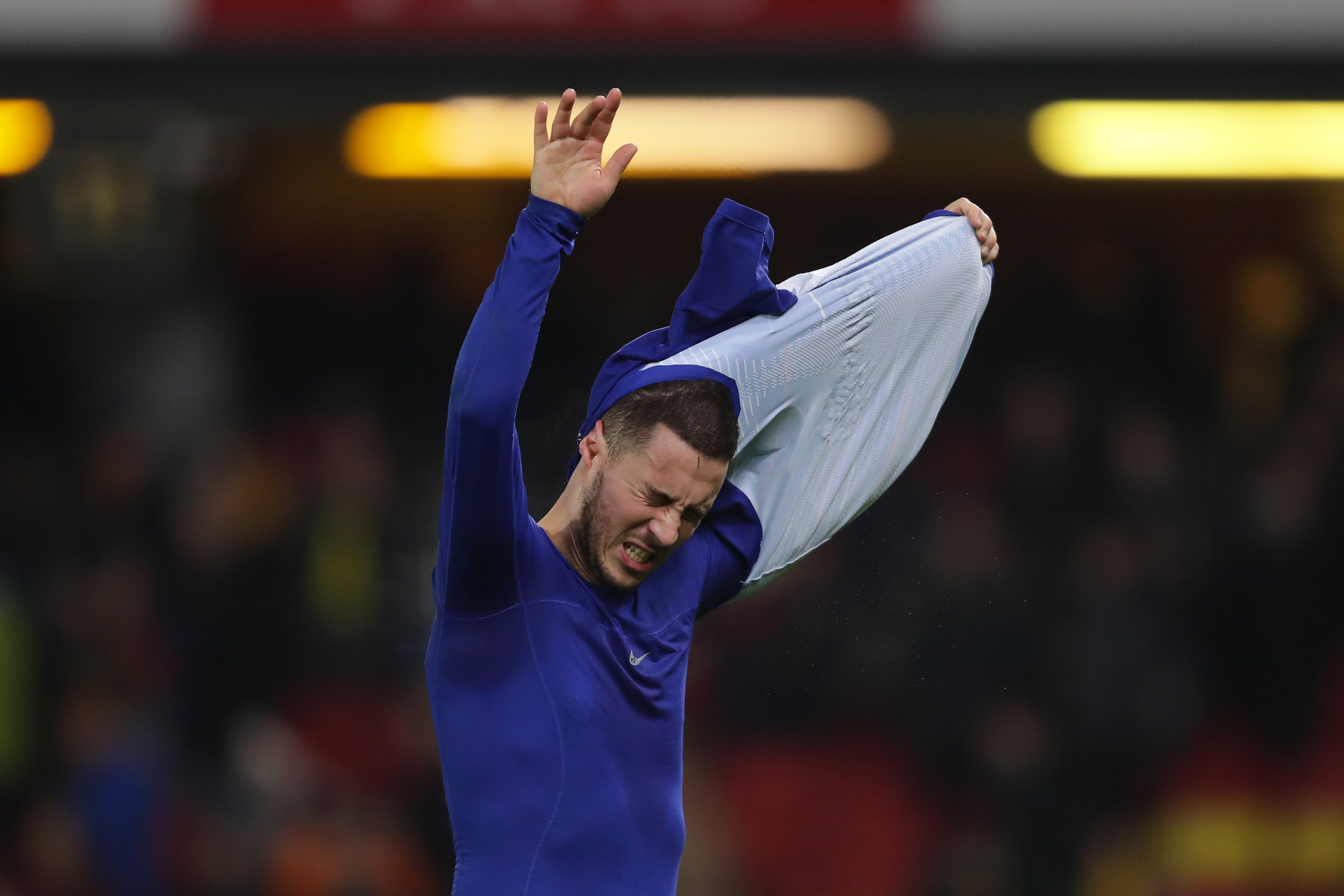 WATFORD, ENGLAND - DECEMBER 26:  Eden Hazard of Chelsea throws his shirt to the fans following his side's victory in the Premier League match between Watford FC and Chelsea FC at Vicarage Road on December 26, 2018 in Watford, United Kingdom.  (Photo by Richard Heathcote/Getty Images)