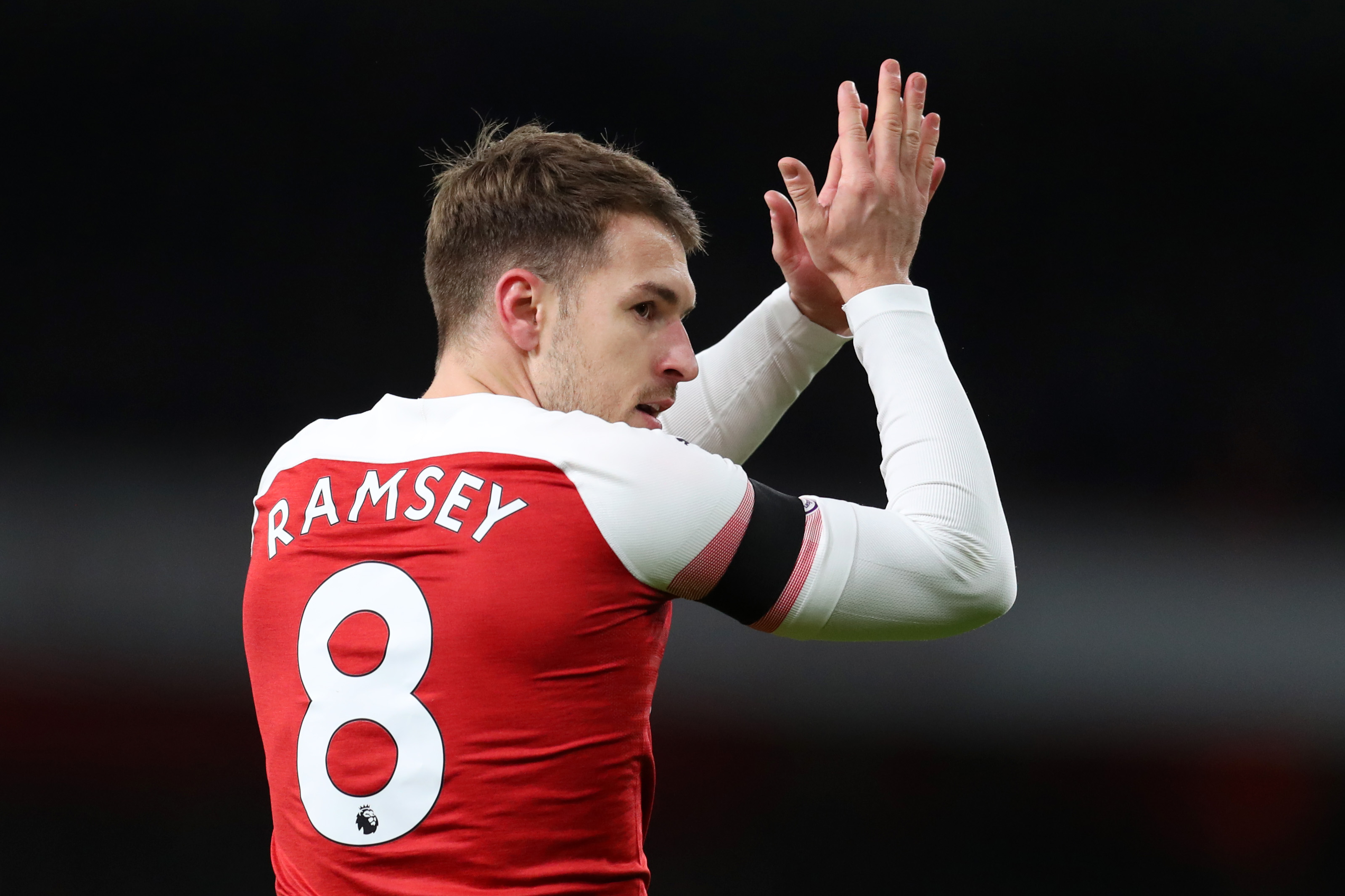 LONDON, ENGLAND - JANUARY 01:  Aaron Ramsey of Arsenal celebrates after scoring his team's third goal during the Premier League match between Arsenal FC and Fulham FC at Emirates Stadium on January 1, 2019 in London, United Kingdom.  (Photo by Catherine Ivill/Getty Images)