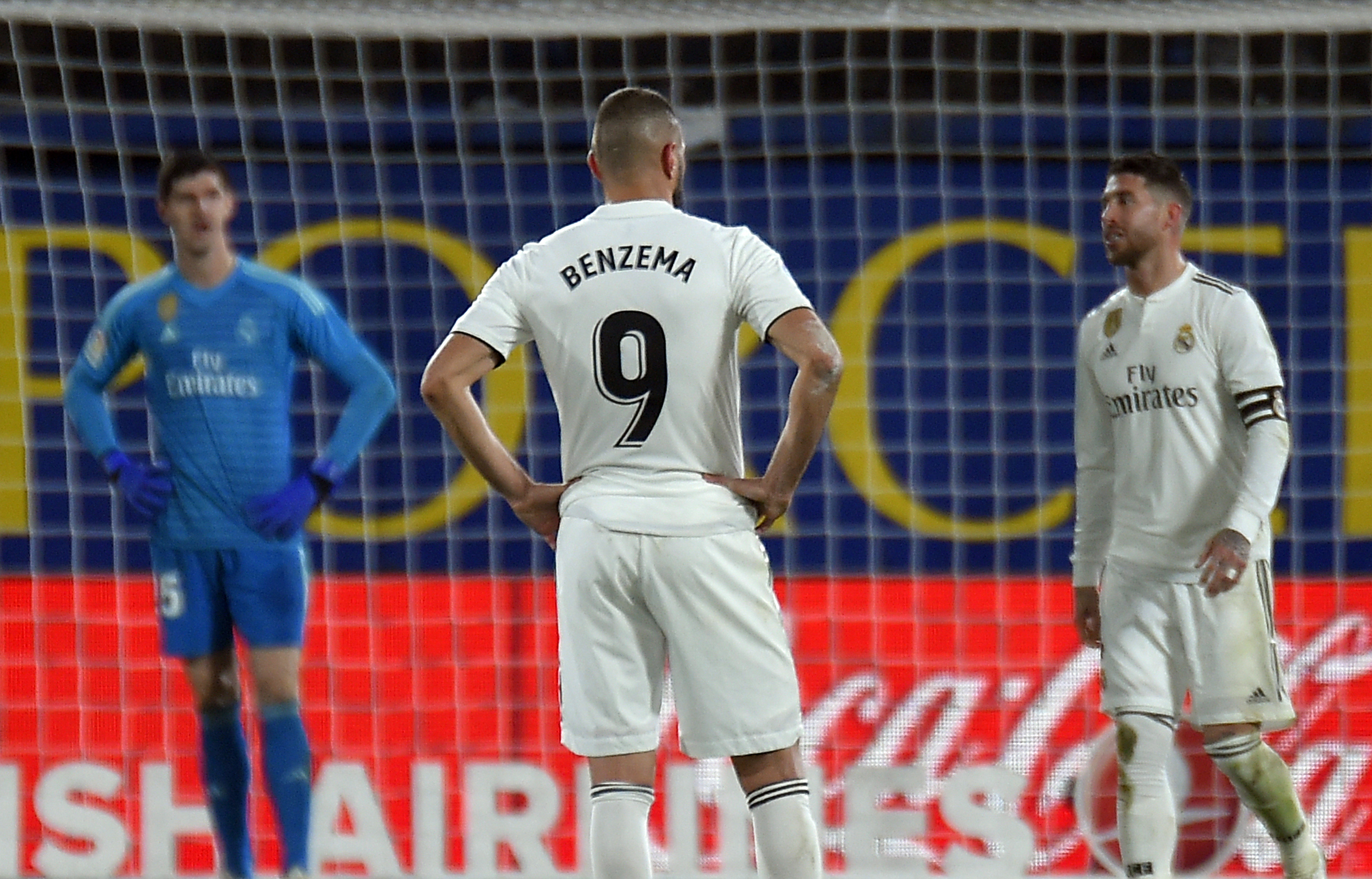 Real Madrid's players react to Villarreal's equalizer during the Spanish League football match between Villarreal CF and Real Madrid CF at La Ceramica stadium in Vila-real on January 3, 2019. (Photo by JOSE JORDAN / AFP)        (Photo credit should read JOSE JORDAN/AFP/Getty Images)