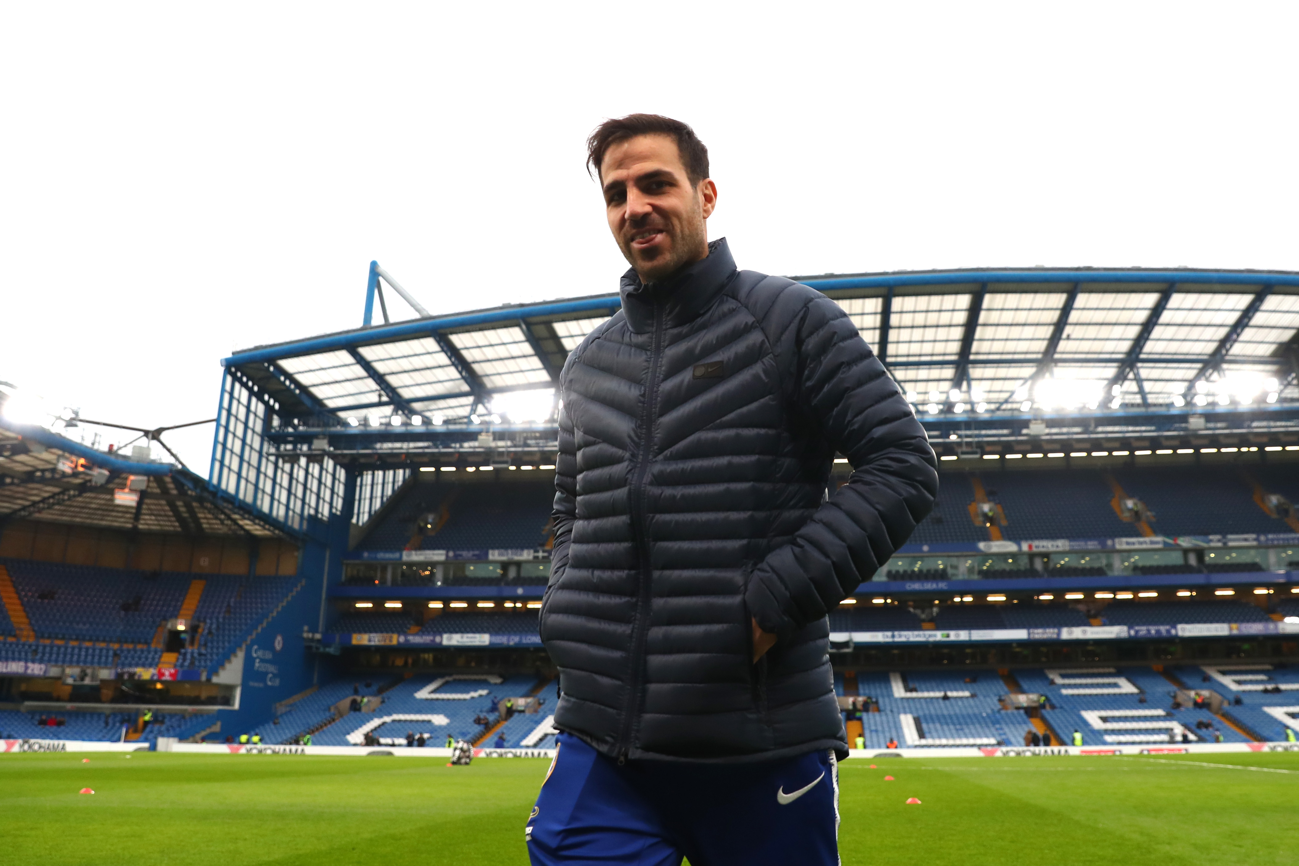 LONDON, ENGLAND - JANUARY 05: Cesc Fabregas of Chelsea walks off after taking a look around the pitch prior to the FA Cup Third Round match between Chelsea and Nottingham Forest at Stamford Bridge on January 5, 2019 in London, United Kingdom.  (Photo by Clive Rose/Getty Images)