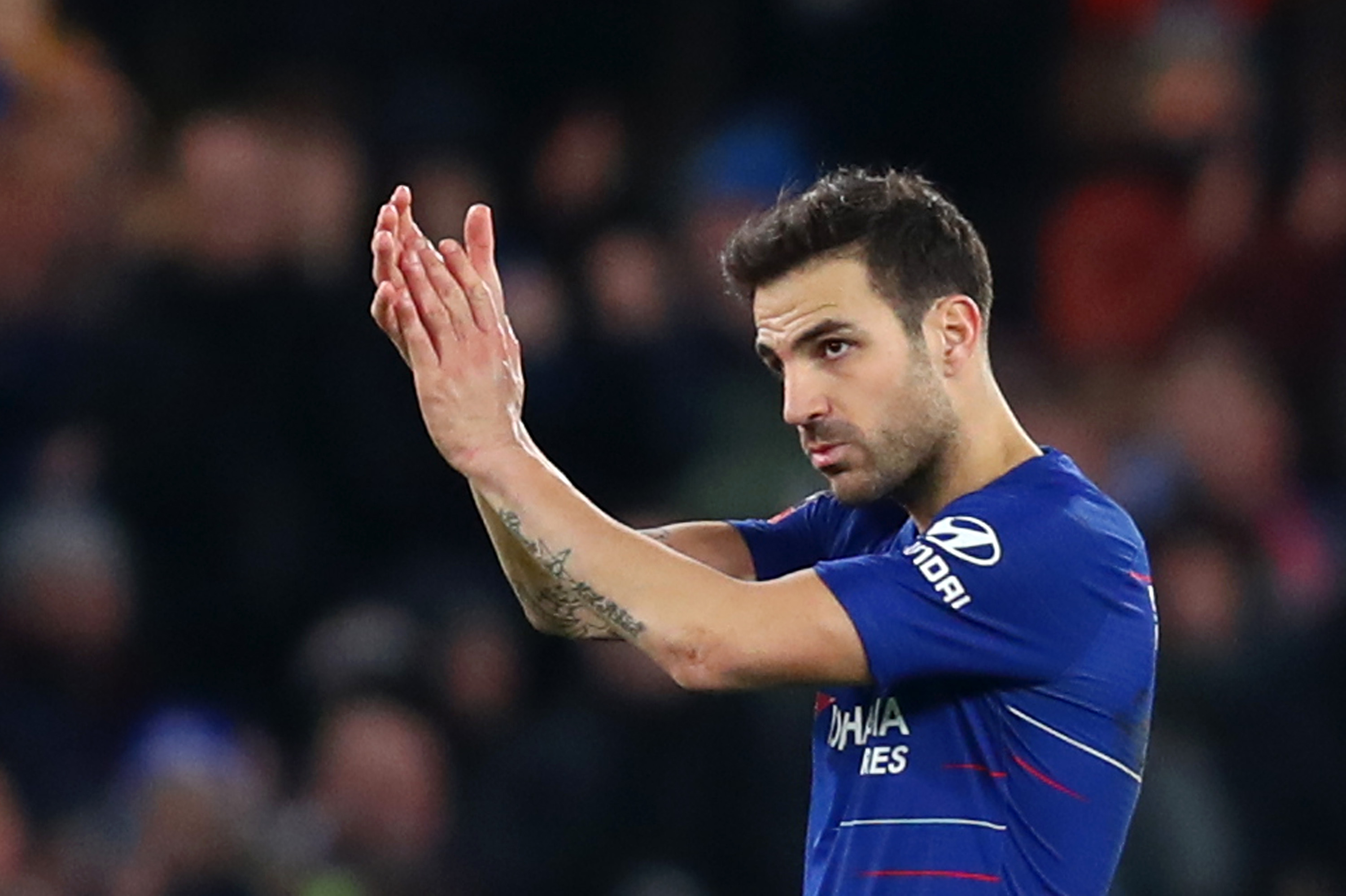 LONDON, ENGLAND - JANUARY 05:  Cesc Fabregas of Chelsea applauds the fans during the FA Cup Third Round match between Chelsea and Nottingham Forest at Stamford Bridge on January 5, 2019 in London, United Kingdom.  (Photo by Clive Rose/Getty Images)