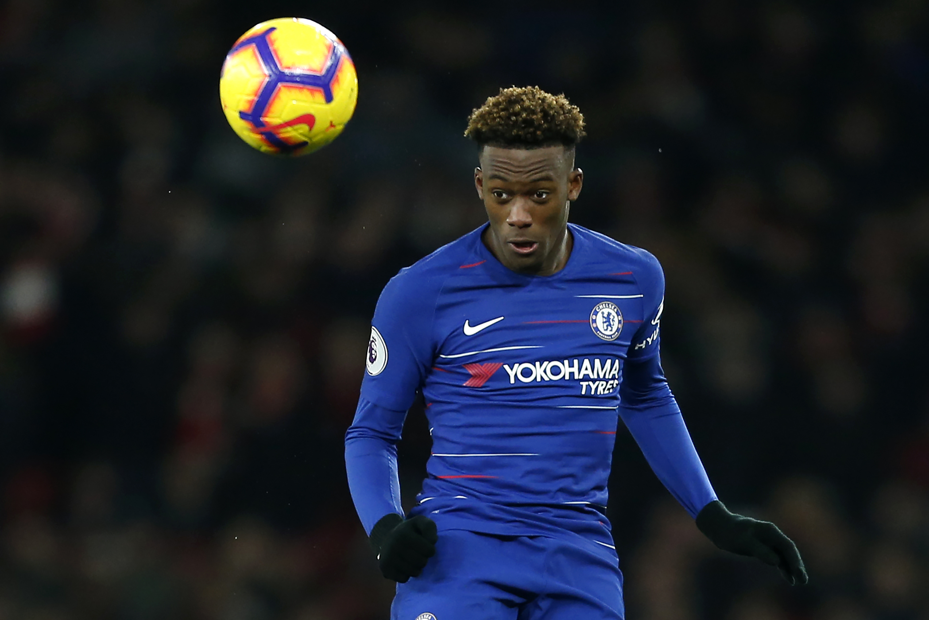 Chelsea's English midfielder Callum Hudson-Odoi heads the ball during the English Premier League football match between Arsenal and Cheslea at the Emirates Stadium in London on January 19, 2019. (Photo by Ian KINGTON / IKIMAGES / AFP) / RESTRICTED TO EDITORIAL USE. No use with unauthorized audio, video, data, fixture lists, club/league logos or 'live' services. Online in-match use limited to 45 images, no video emulation. No use in betting, games or single club/league/player publications.        (Photo credit should read IAN KINGTON/AFP/Getty Images)