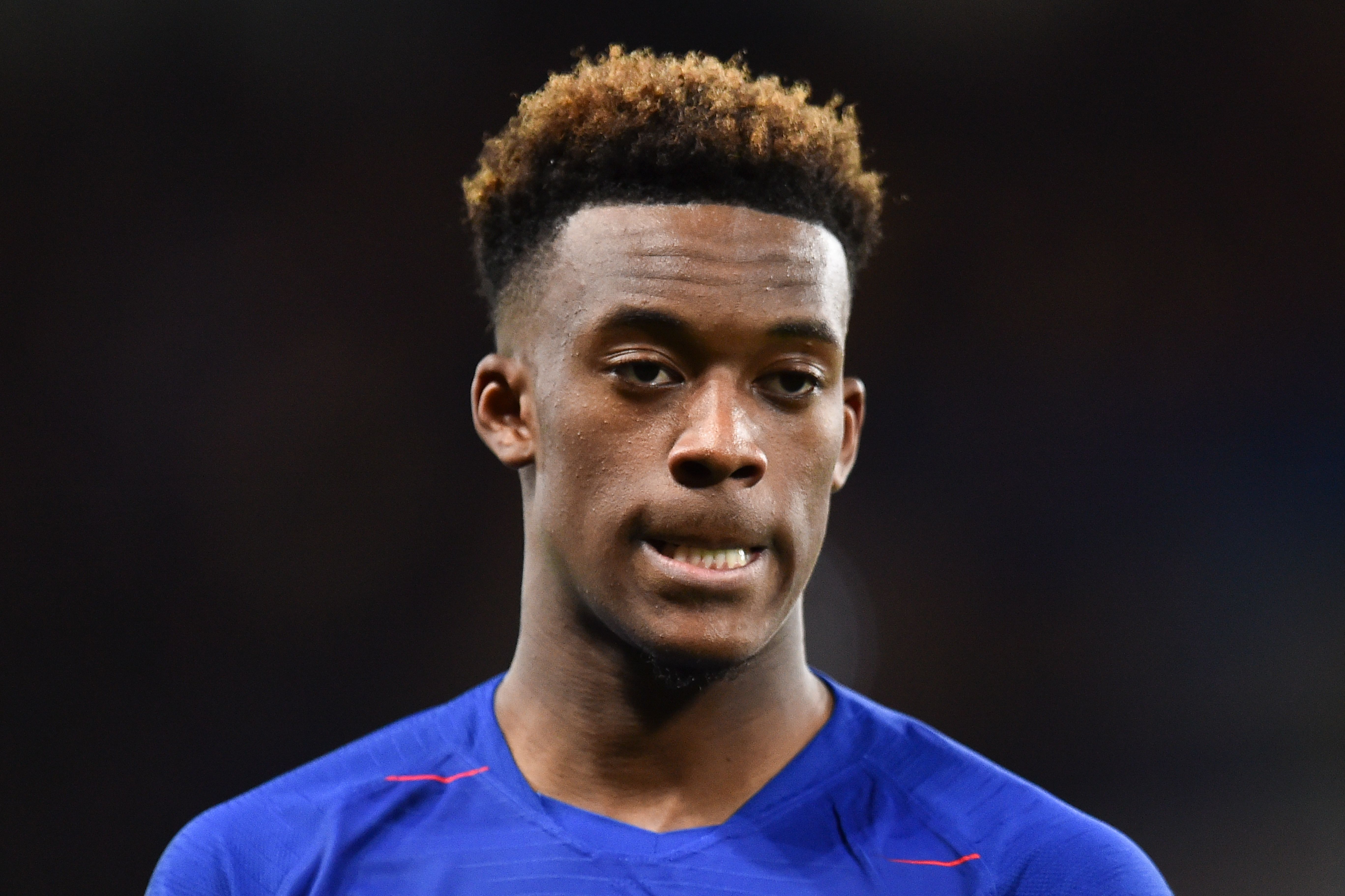 Chelsea's English midfielder Callum Hudson-Odoi reacts during the English FA Cup fourth round football match between Chelsea and Sheffield Wednesday at Stamford Bridge in London on January 27, 2019. (Photo by Glyn KIRK / AFP) / RESTRICTED TO EDITORIAL USE. No use with unauthorized audio, video, data, fixture lists, club/league logos or 'live' services. Online in-match use limited to 120 images. An additional 40 images may be used in extra time. No video emulation. Social media in-match use limited to 120 images. An additional 40 images may be used in extra time. No use in betting publications, games or single club/league/player publications. /         (Photo credit should read GLYN KIRK/AFP/Getty Images)