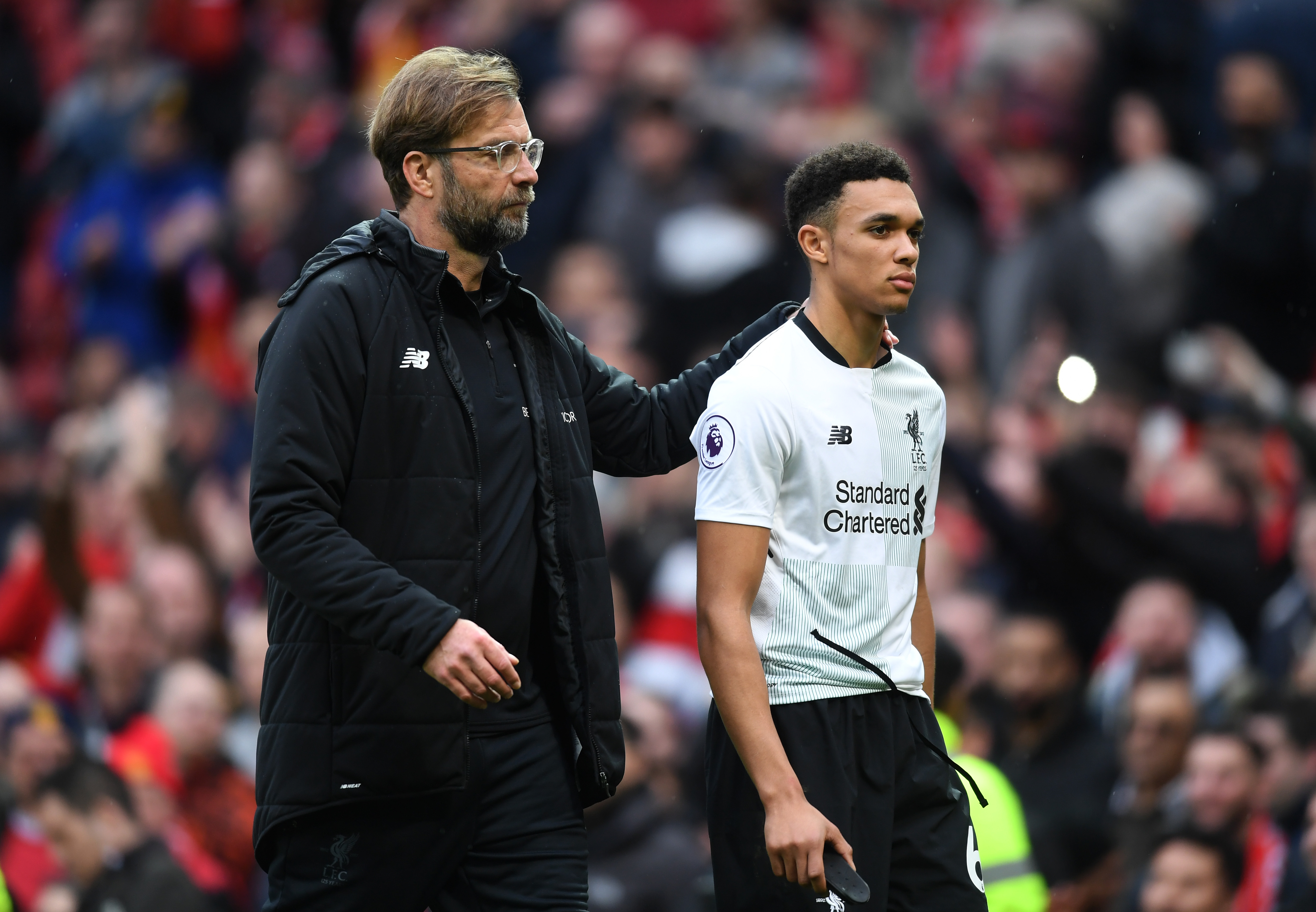 MANCHESTER, ENGLAND - MARCH 10: Trent Alexander-Arnold of Liverpool with Jurgen Klopp, Manager of Liverpool after the Premier League match between Manchester United and Liverpool at Old Trafford on March 10, 2018 in Manchester, England.  (Photo by Michael Regan/Getty Images)