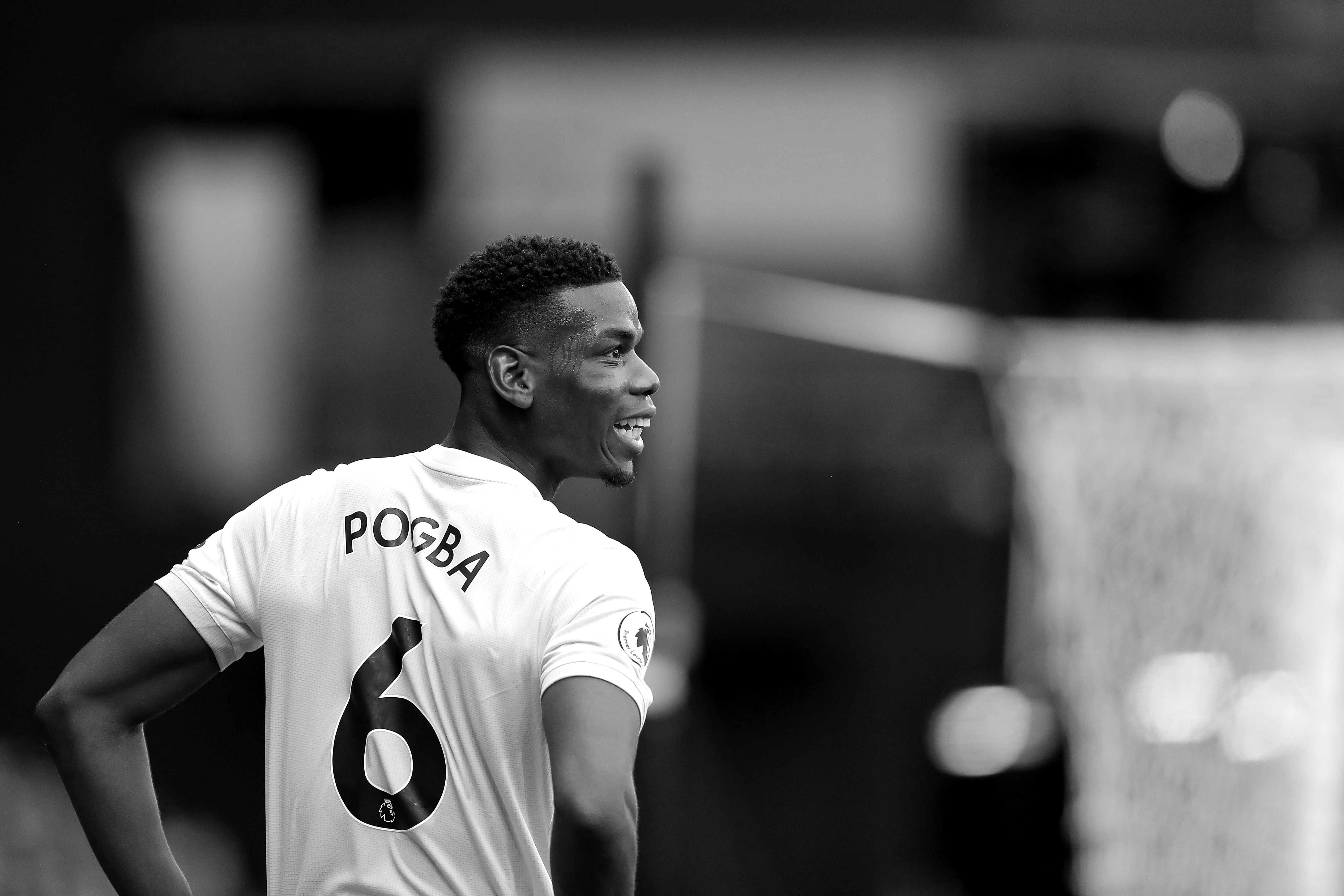 WATFORD, ENGLAND - SEPTEMBER 15: (EDITORS NOTE: THIS IMAGE HAS BEEN CONVERTED TO BLACK & WHITE) Paul Pogba of Manchester United in action during the Premier League match between Watford FC and Manchester United at Vicarage Road on September 15, 2018 in Watford, United Kingdom. (Photo by Richard Heathcote/Getty Images)