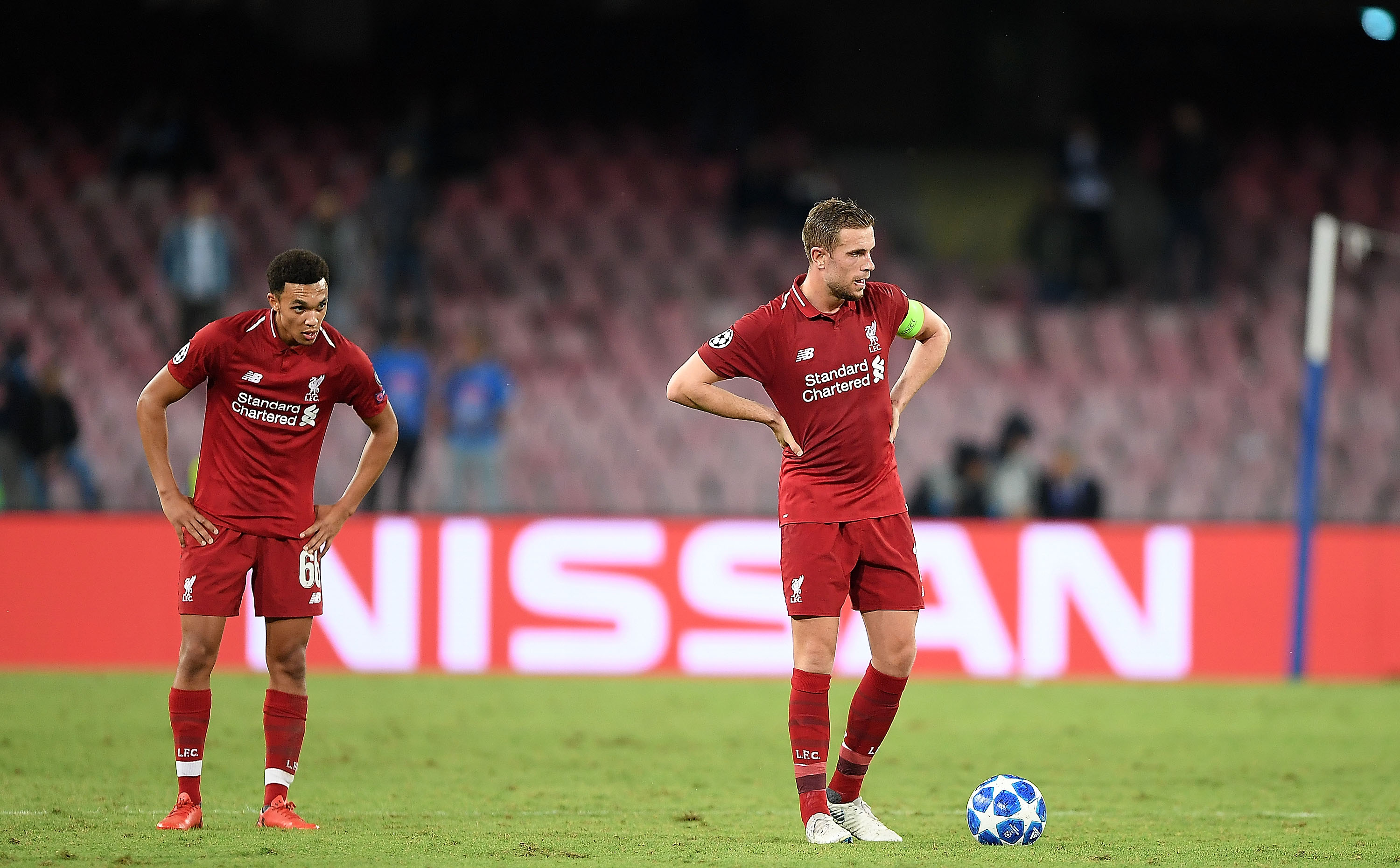 NAPLES, ITALY - OCTOBER 03: Jordan Henderson and Trent Alexander-Arnold of Liverpool stand disappointed during the Group C match of the UEFA Champions League between SSC Napoli and Liverpool at Stadio San Paolo on October 3, 2018 in Naples, Italy.  (Photo by Francesco Pecoraro/Getty Images)