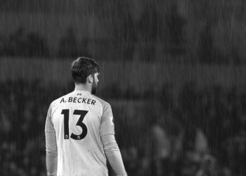 WOLVERHAMPTON, ENGLAND - DECEMBER 21: (EDITORS NOTE: THIS IMAGE HAS BEEN CONVERTED TO BLACK & WHITE) The rain pours past Alisson Becker of Liverpool during the Premier League match between Wolverhampton Wanderers and Liverpool FC at Molineux on December 21, 2018 in Wolverhampton, United Kingdom. (Photo by Richard Heathcote/Getty Images)