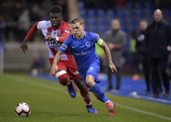 Mouscron's Franck Boya and Genk's Leandro Trossard fight for the ball during a soccer match between KRC Genk and Royal Excel Mouscron, Saturday 26 January 2019 in Genk, on the 23rd day of the 'Jupiler Pro League' Belgian soccer championship season 2018-2019. BELGA PHOTO YORICK JANSENS        (Photo credit should read YORICK JANSENS/AFP/Getty Images)