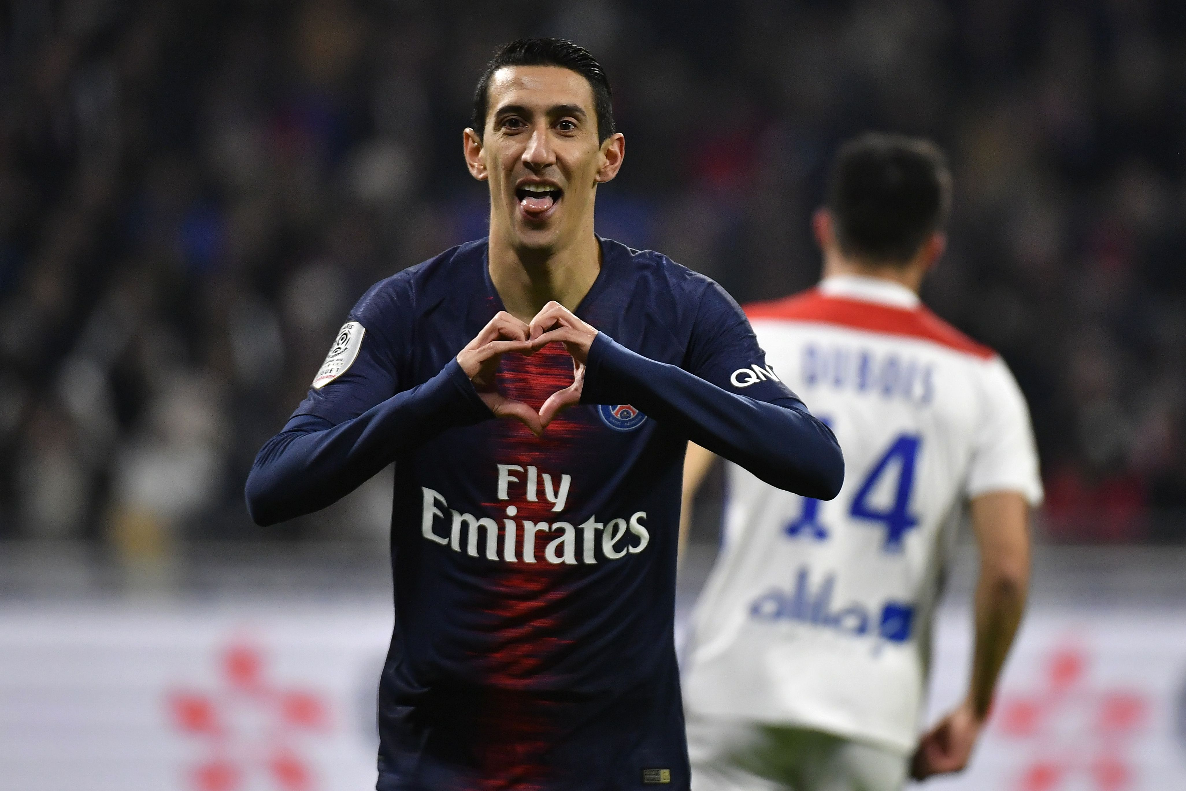 Paris Saint-Germain's Argentine midfielder Angel Di Maria celebrates after scoring the first goal of the French L1 football match between Olympique Lyonnais (OL) and Paris-Saint Germain (PSG) at Groupama stadium in Decines-Charpieu, near Lyon, on February 3, 2019. (Photo by JEFF PACHOUD / AFP)        (Photo credit should read JEFF PACHOUD/AFP/Getty Images)