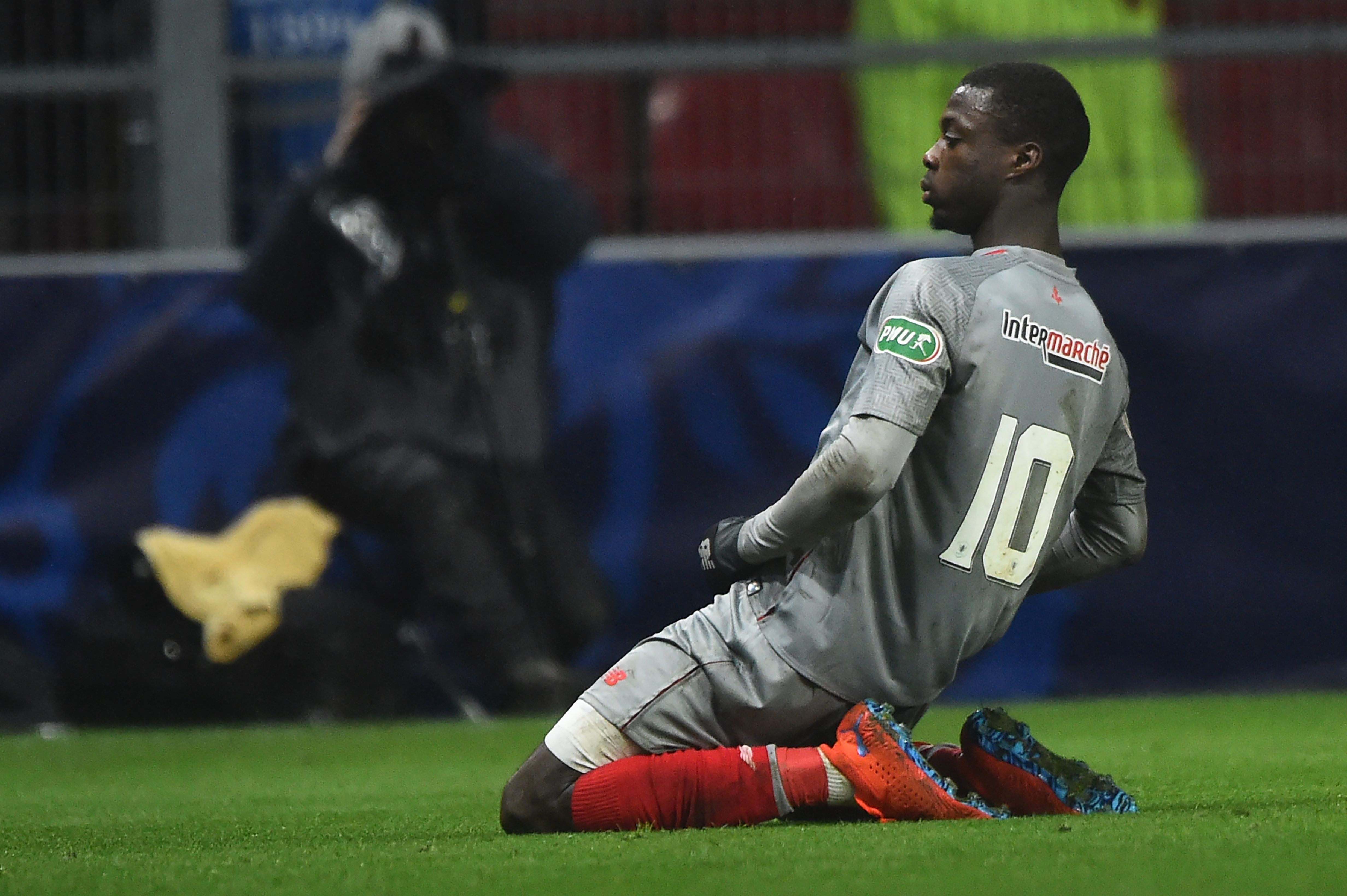 Lille's Ivorian forward Nicolas Pepe celebrates after scoring a goal during the French Cup round of 16 football match between Rennes and Lille on February 6, 2019 at the Roazhon Park in Rennes, northwestern France. (Photo by JEAN-FRANCOIS MONIER / AFP)        (Photo credit should read JEAN-FRANCOIS MONIER/AFP/Getty Images)