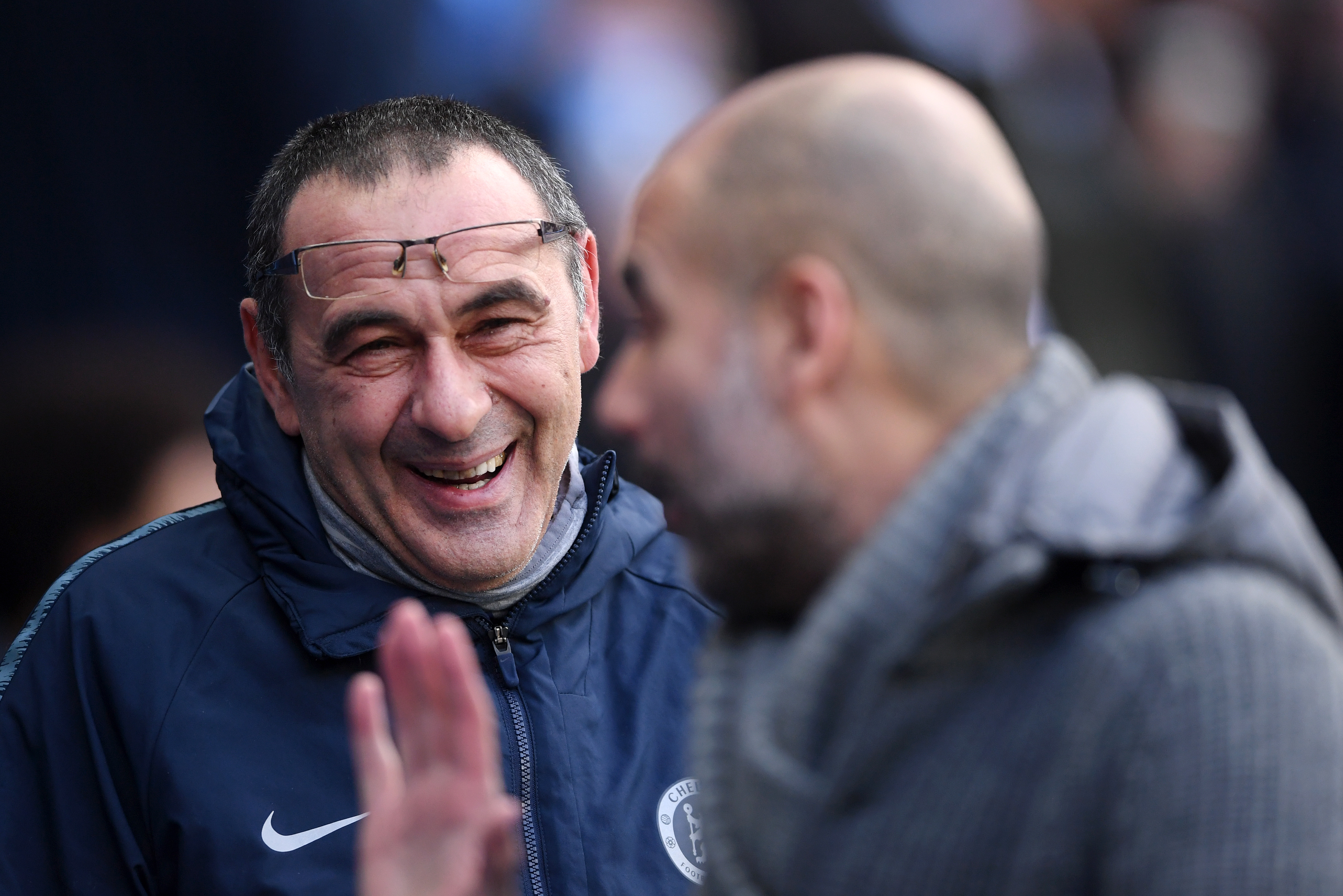 MANCHESTER, ENGLAND - FEBRUARY 10:  Maurizio Sarri, Manager of Chelsea speaks to Josep Guardiola, Manager of Manchester City prior to the Premier League match between Manchester City and Chelsea FC at Etihad Stadium on February 10, 2019 in Manchester, United Kingdom.  (Photo by Laurence Griffiths/Getty Images)