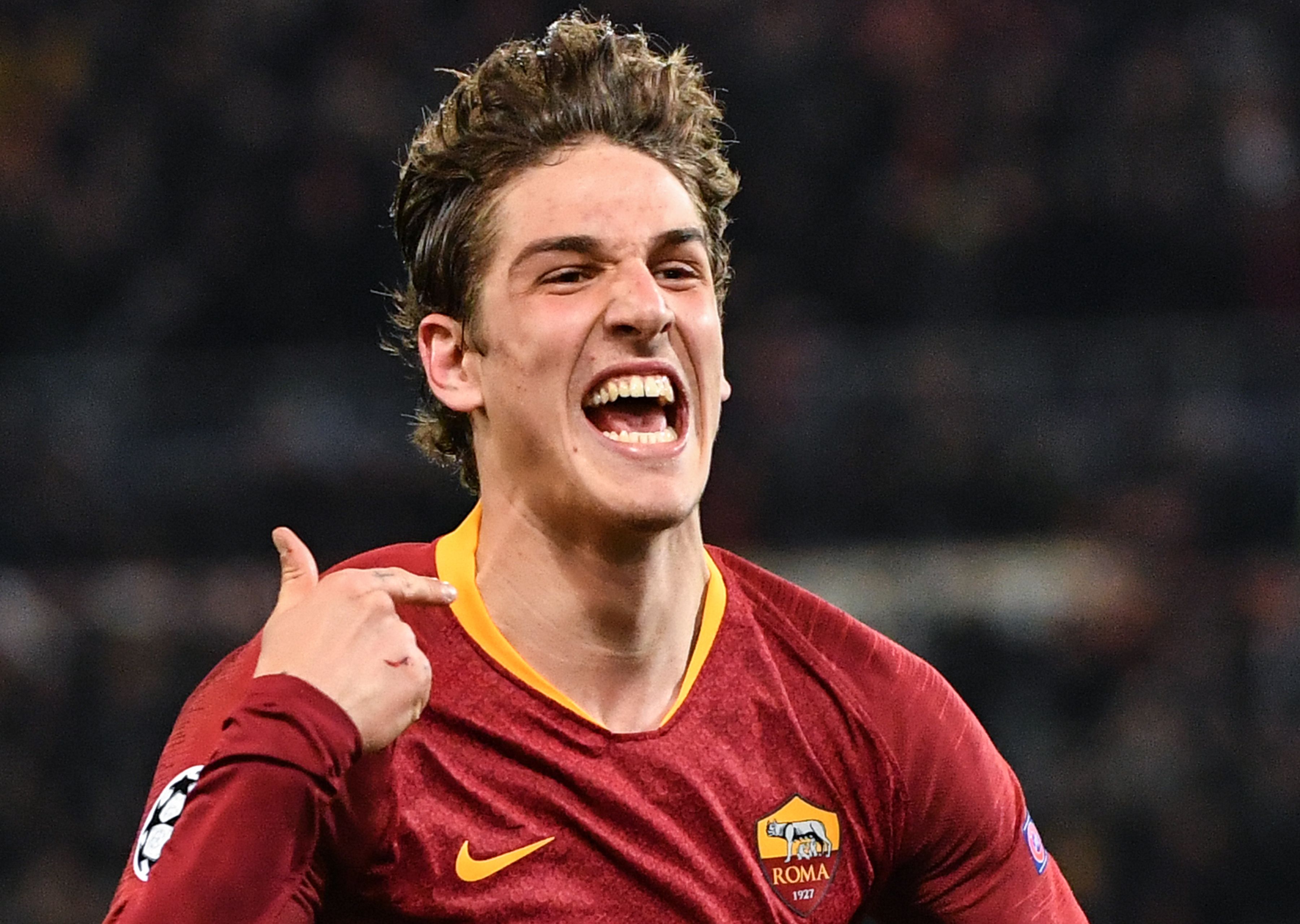 AS Roma Italian midfielder Nicolo Zaniolo celebrates after opening the scoring during the UEFA Champions League round of 16, first leg football match AS Roma vs FC Porto on February 12, 2019 at the Olympic stadium in Rome. (Photo by Andreas SOLARO / AFP)        (Photo credit should read ANDREAS SOLARO/AFP/Getty Images)