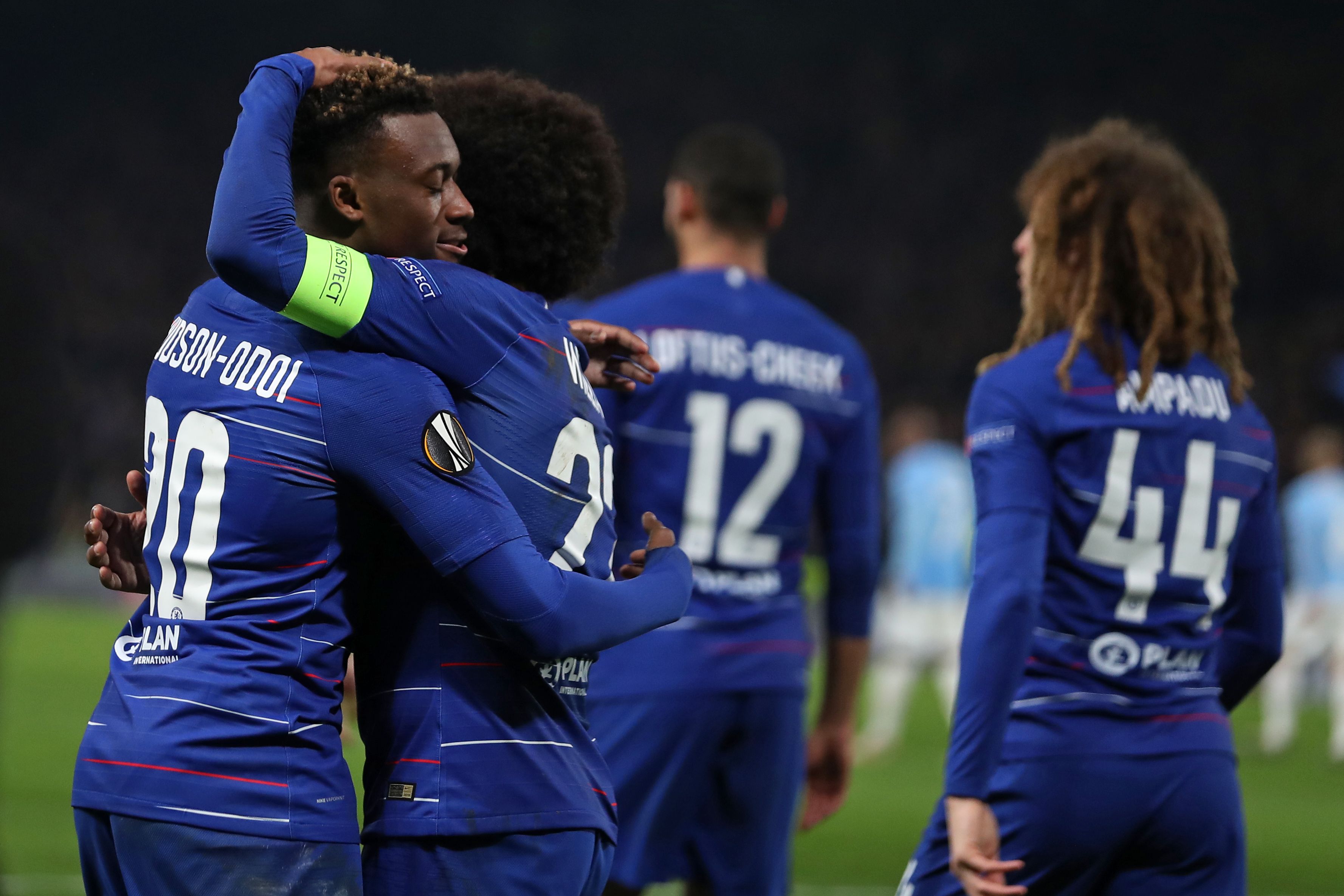 Chelsea's English midfielder Callum Hudson-Odoi (L) celebrates with teammates after scoring their third goal during the UEFA Europa League round of 32, 2nd leg football match between Chelsea and Malmo at Stamford Bridge in London on February 21, 2019. (Photo by Daniel LEAL-OLIVAS / AFP)        (Photo credit should read DANIEL LEAL-OLIVAS/AFP/Getty Images)