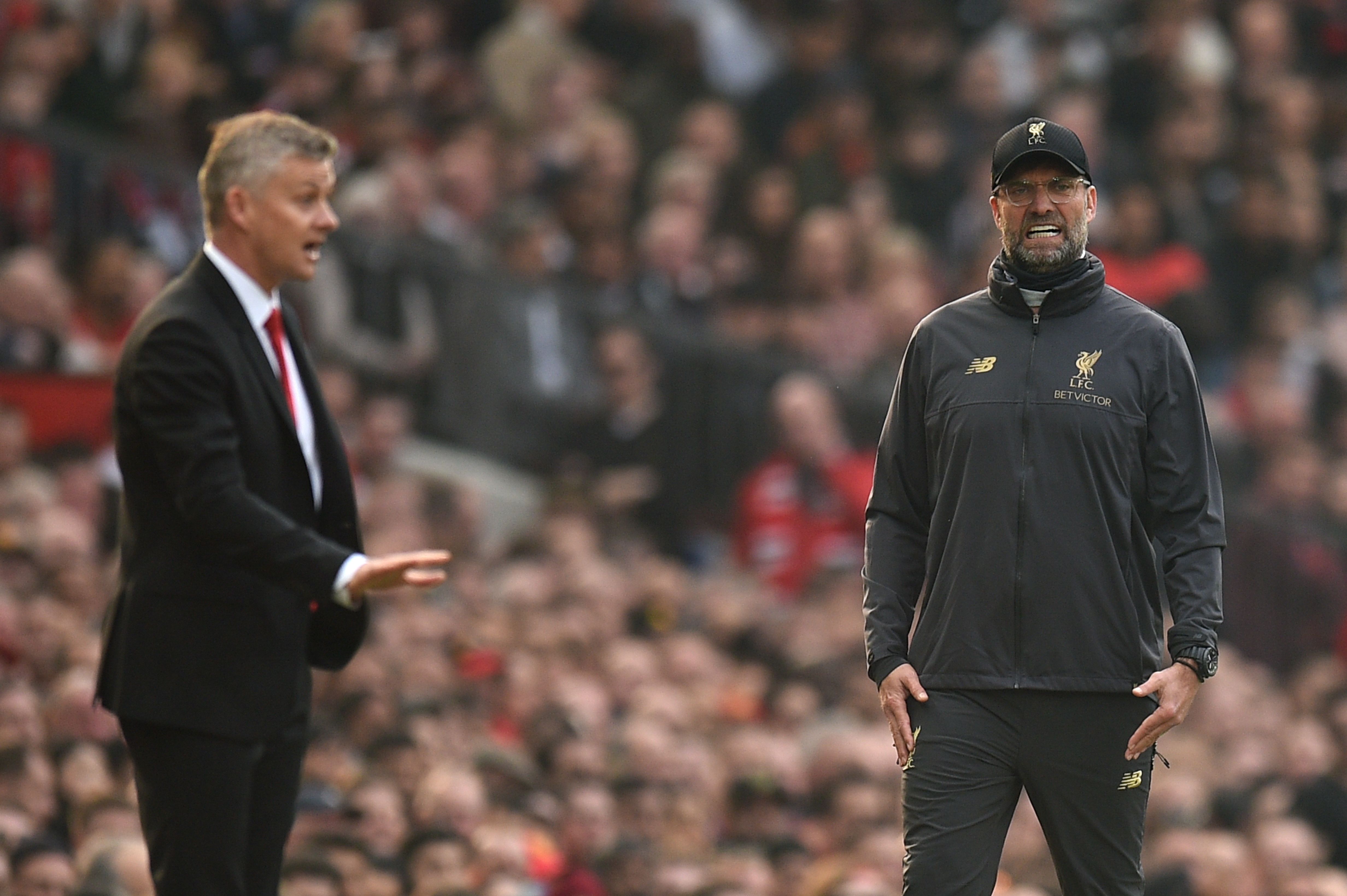 Solskjaer and Klopp will be aiming for the league title (Photo by OLI SCARFF/AFP/Getty Images)