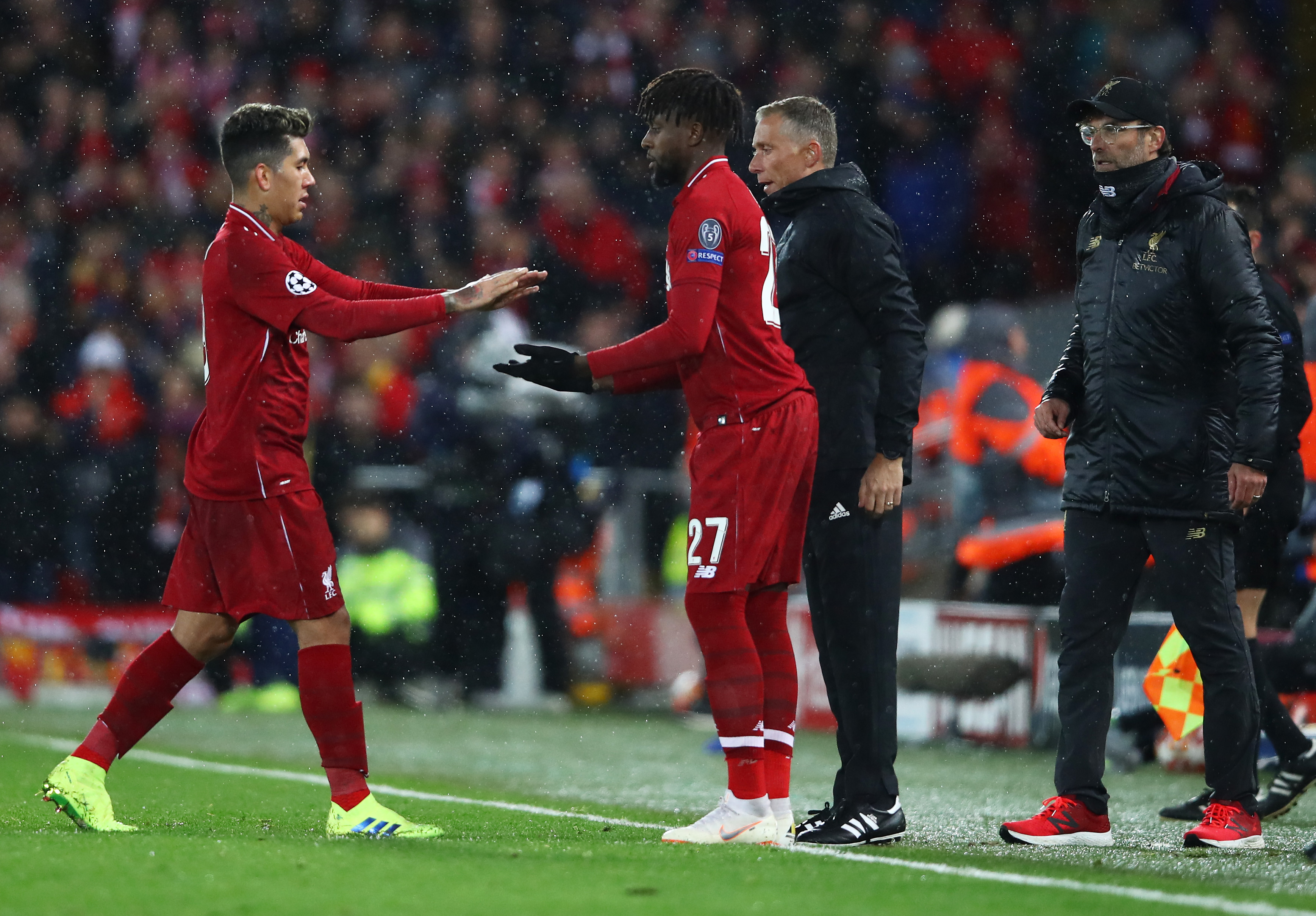LIVERPOOL, ENGLAND - FEBRUARY 19:  Subsitute Divock Origi of Liverpool replaces Roberto Firmino during the UEFA Champions League Round of 16 First Leg match between Liverpool and FC Bayern Muenchen at Anfield on February 19, 2019 in Liverpool, England. (Photo by Clive Brunskill/Getty Images)