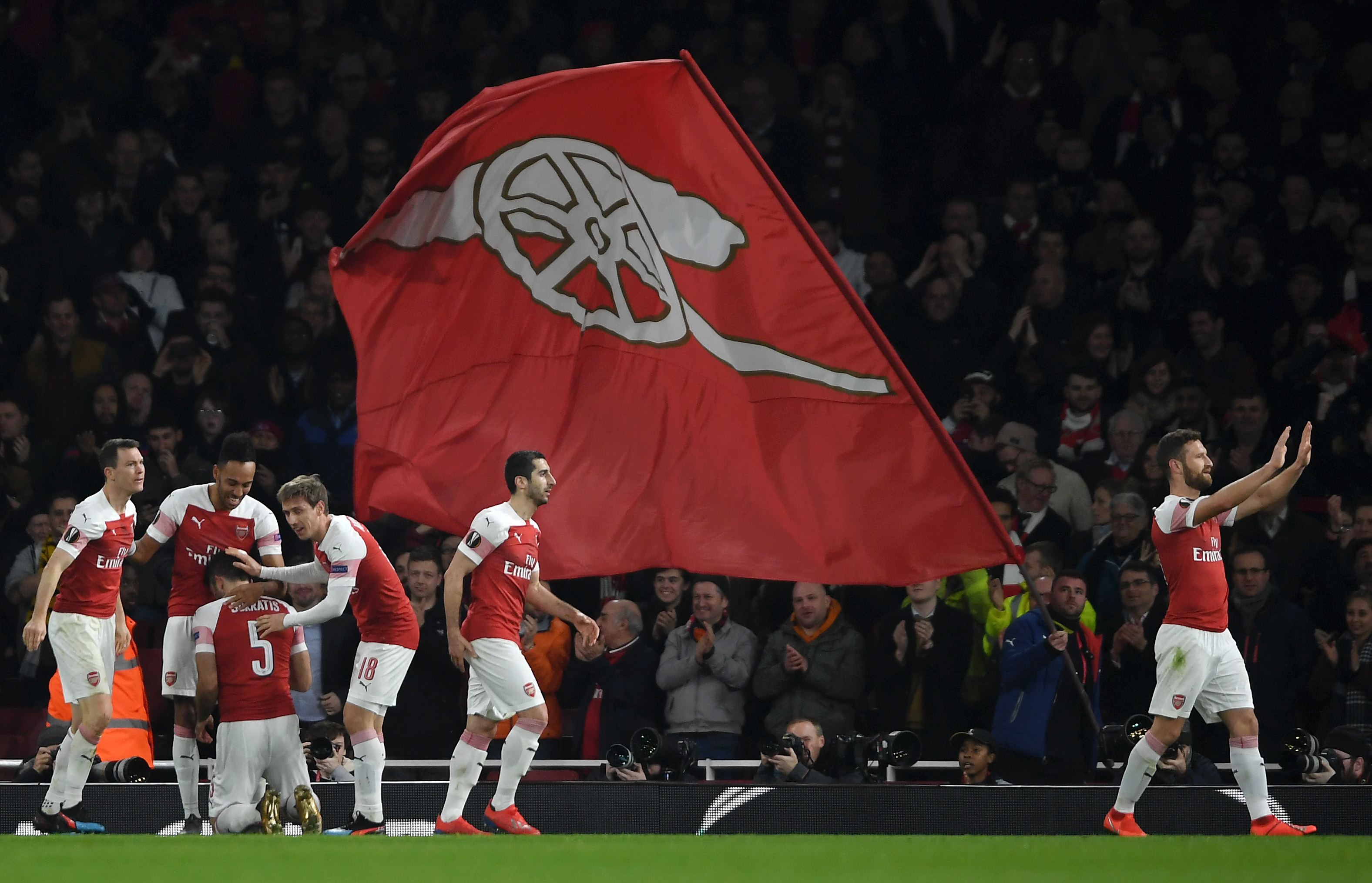 LONDON, ENGLAND - FEBRUARY 21: Sokratis Papastathopoulos of Arsenal celebrates with teammates after scoring his team's third goal during the UEFA Europa League Round of 32 Second Leg match between Arsenal and BATE Borisov at Emirates Stadium on February 21, 2019 in London, United Kingdom. (Photo by Mike Hewitt/Getty Images)