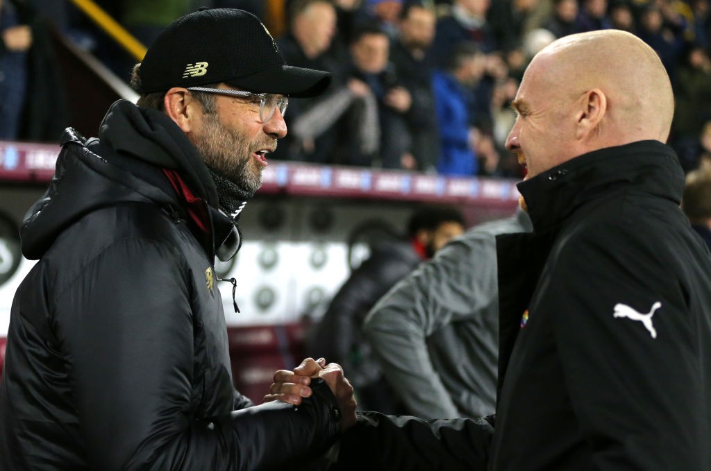 BURNLEY, ENGLAND - DECEMBER 05: Jurgen Klopp, Manager of Liverpool and Sean Dyche, Manager of Burnley embrace prior to the Premier League match between Burnley FC and Liverpool FC at Turf Moor on December 5, 2018 in Burnley, United Kingdom. (Photo by Nigel Roddis/Getty Images)