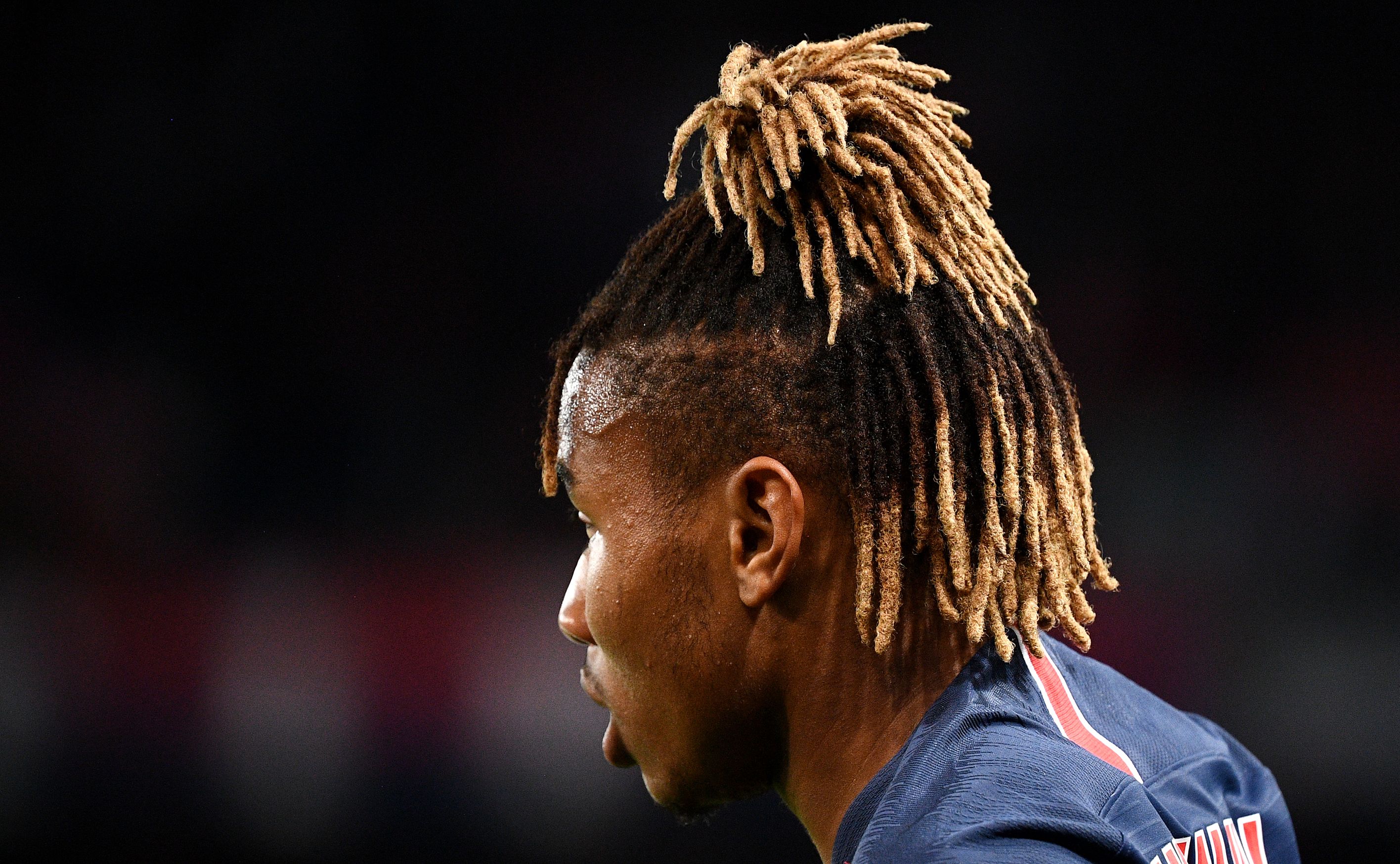 A picture shows the haircut of Paris Saint-Germain's French midfielder Christopher Nkunku during the French L1 football match between Paris Saint-Germain (PSG) and Saint-Etienne (ASSE) at the Parc des Princes stadium in Paris on September 14, 2018. (Photo by FRANCK FIFE / AFP)        (Photo credit should read FRANCK FIFE/AFP/Getty Images)