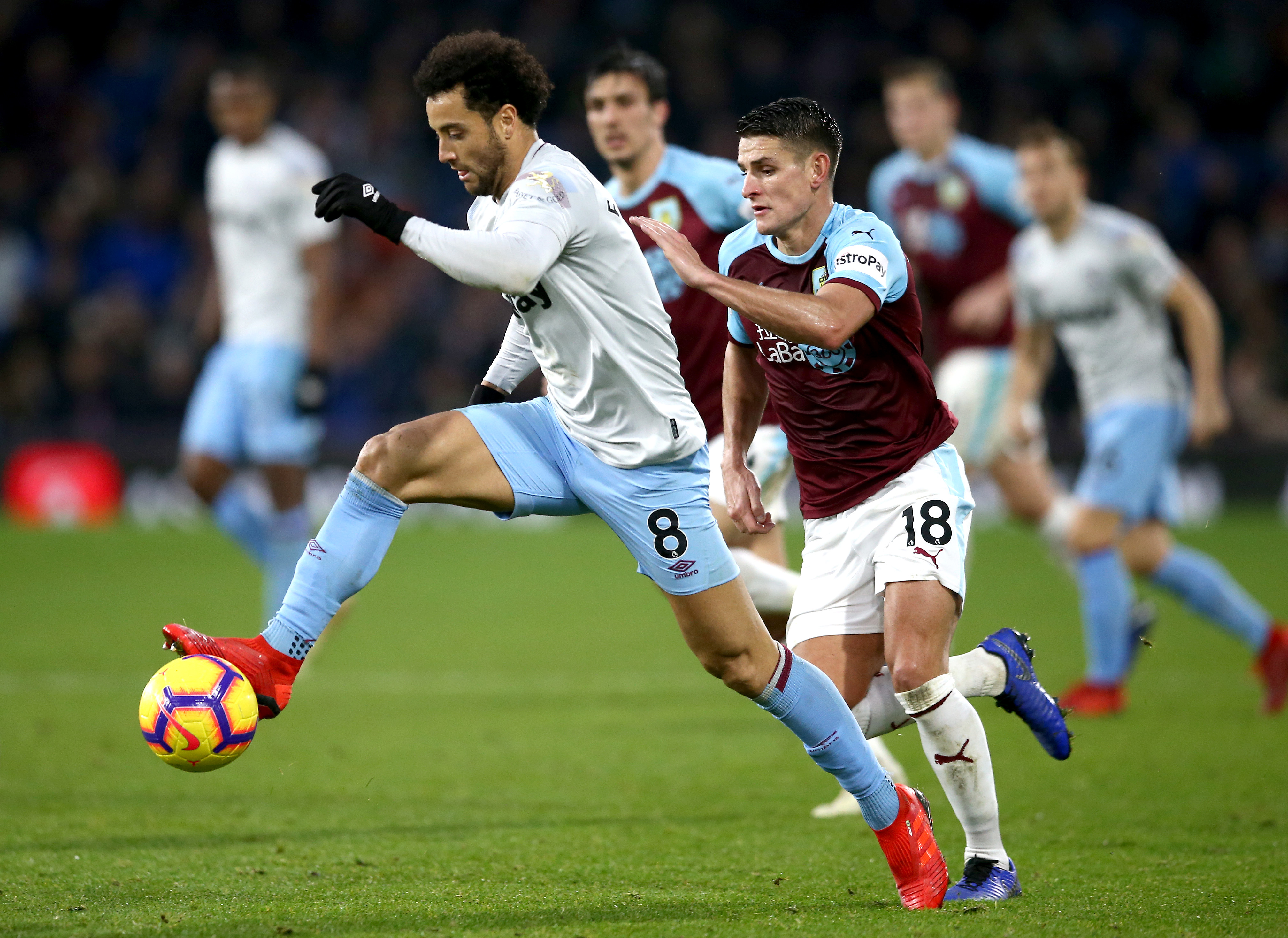 BURNLEY, ENGLAND - DECEMBER 30: Felipe Anderson of West Ham United is challenged by Ashley Westwood of Burnley during the Premier League match between Burnley FC and West Ham United at Turf Moor on December 29, 2018 in Burnley, United Kingdom.  (Photo by Jan Kruger/Getty Images)