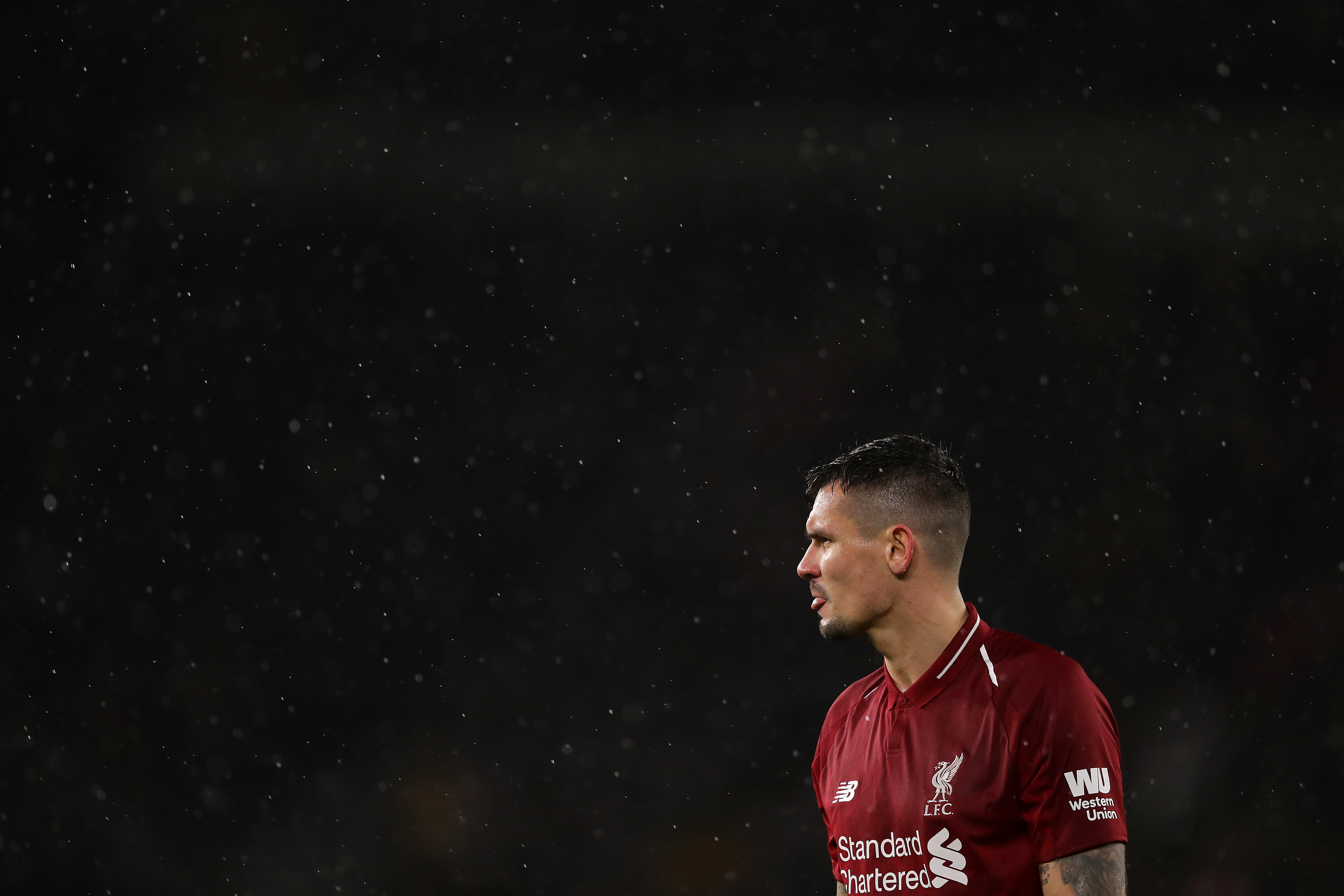 WOLVERHAMPTON, ENGLAND - DECEMBER 21: Dejan Lovren of Liverpool in action during the Premier League match between Wolverhampton Wanderers and Liverpool FC at Molineux on December 21, 2018 in Wolverhampton, United Kingdom. (Photo by Richard Heathcote/Getty Images)